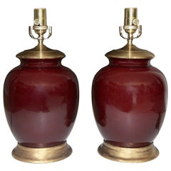 Pair of Asian Oxblood Porcelain Lamps