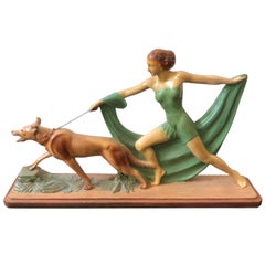 Art Deco British Polychrome Ceramic Girl with Dog Statue, circa 1930