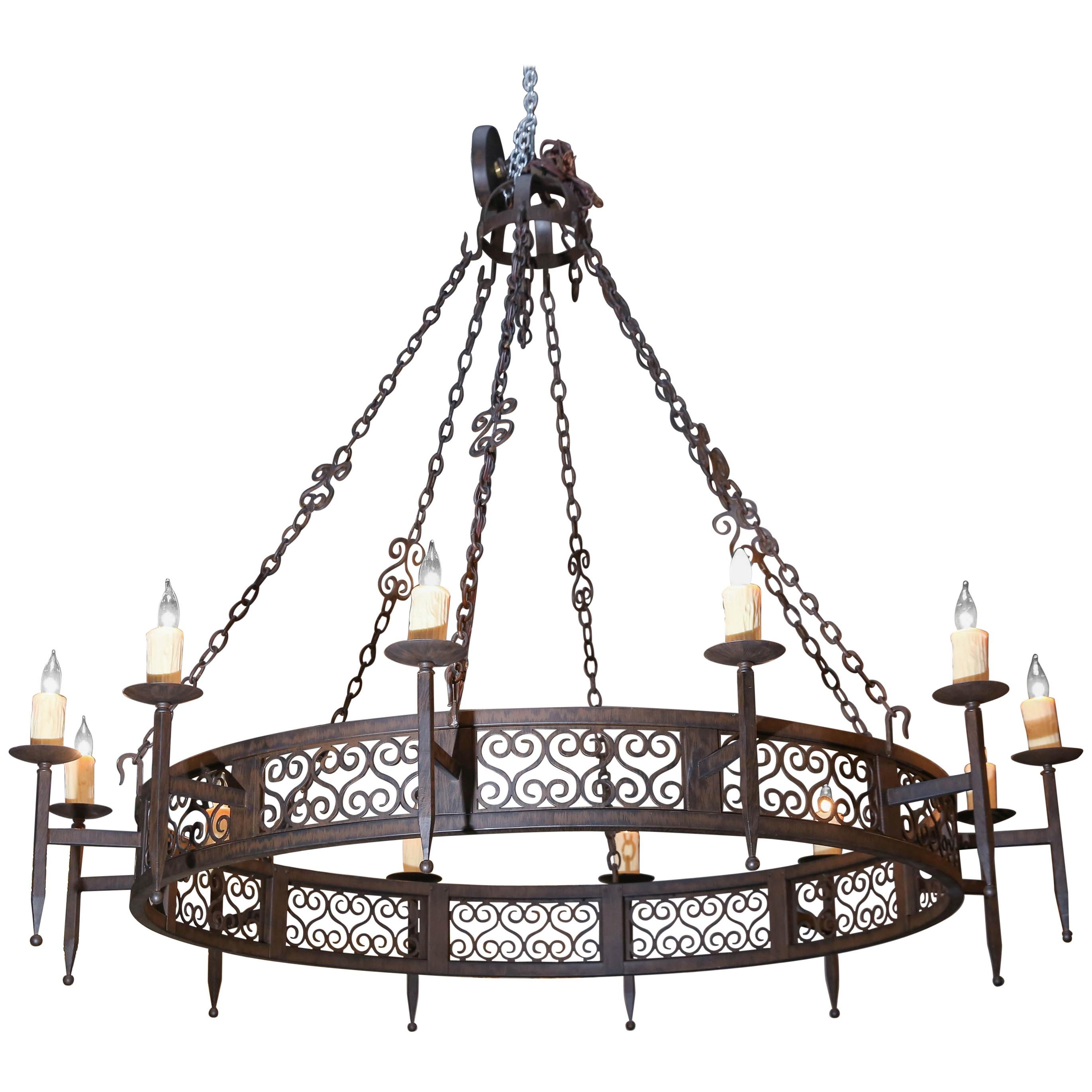 Large Spanish Style Wrought Iron Twelve-Light Chandelier For Sale