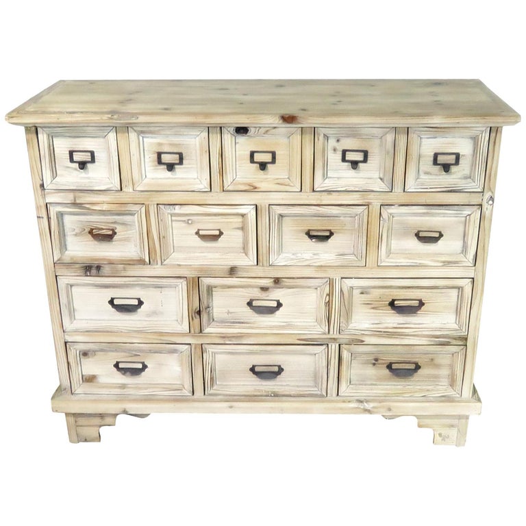 Multi Drawer Apothecary Style Dresser In Distressed White Paint