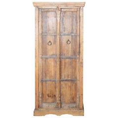 Indian Used Wooden Armoire with Metal Braces and Hand-Carved Decor