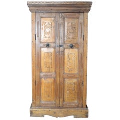 Indian Vintage Wooden Armoire with Hand-Carved Radiating Sun Motifs