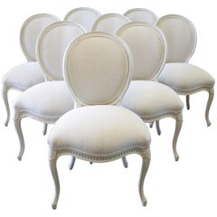Set of Eight Painted and Upholstered Louis XV Style Dining Chairs