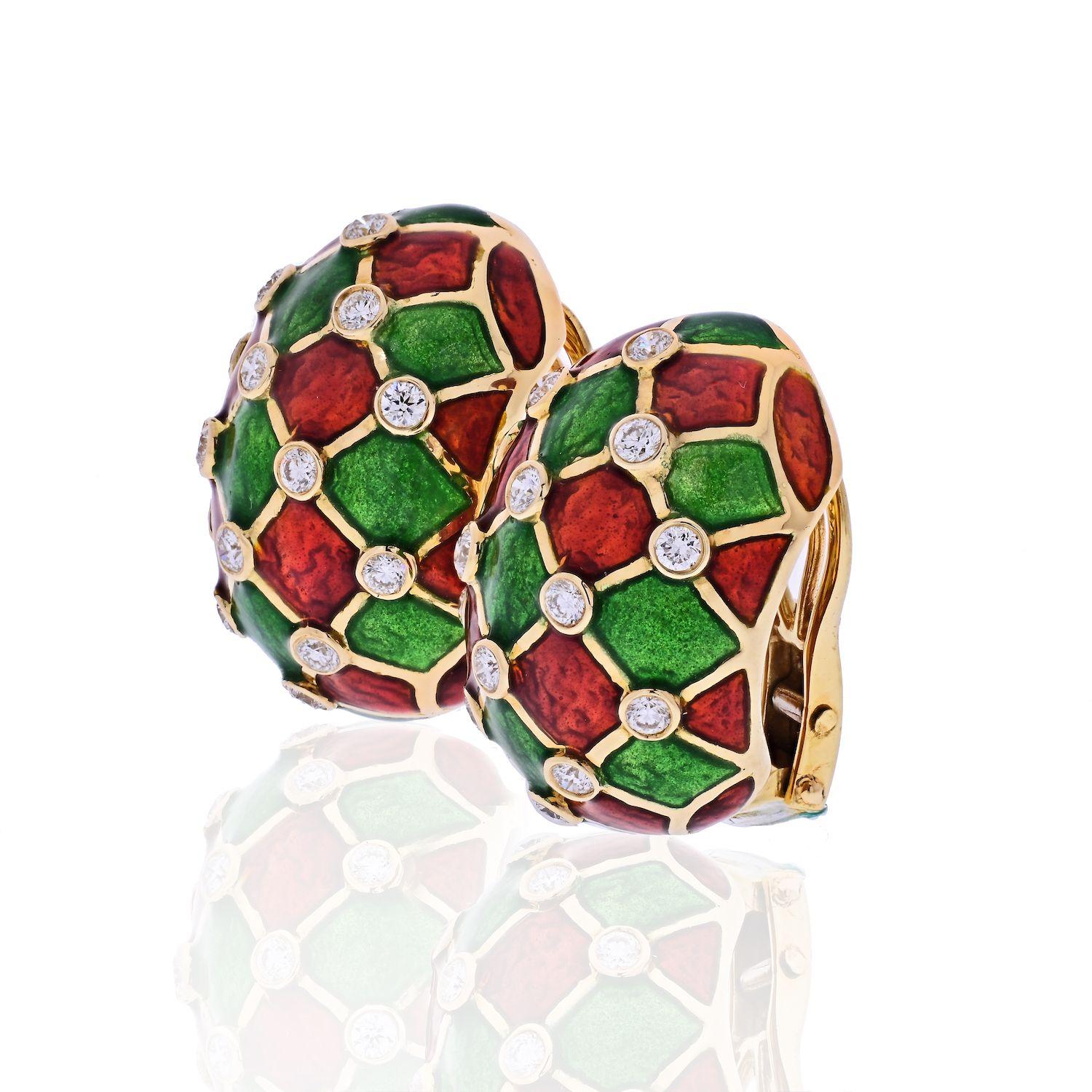 This glamorous pair of David Webb earrings is simply jaw dropping. The perfect gift for any lady truly deserving of sophistication and class. Finished with green and red enameling, accented by round cut diamonds. Measuring 25mm long. Clip-on