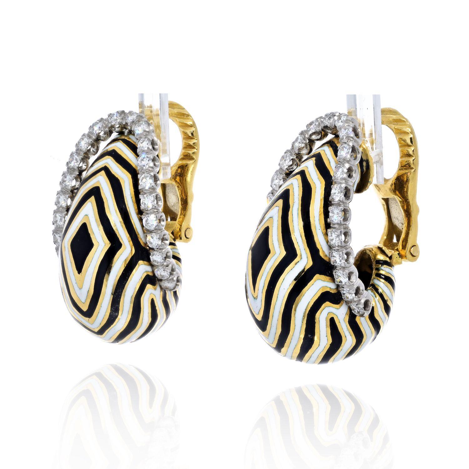 This is a staple of a design: Zebra Diamond Earrings by David Webb. Accented with round diamonds, wearable length and size these clip earrings can be a perfect gift for any jewelry lover. Black and white enameling is in great condition. Length: 1