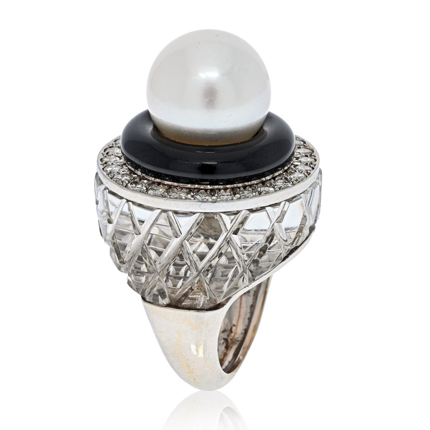 The cocktail ring was developed for the rebellious twenties flapper. Deliberately bold and eye-catching, it was designed to attract attention to the drink in her hand during prohibition. Presented here rock crystal pearl and diamond ring by David
