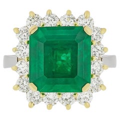 David Webb Platinum & 18K Yellow Gold 6.86 Carat Emerald and Diamond Ring