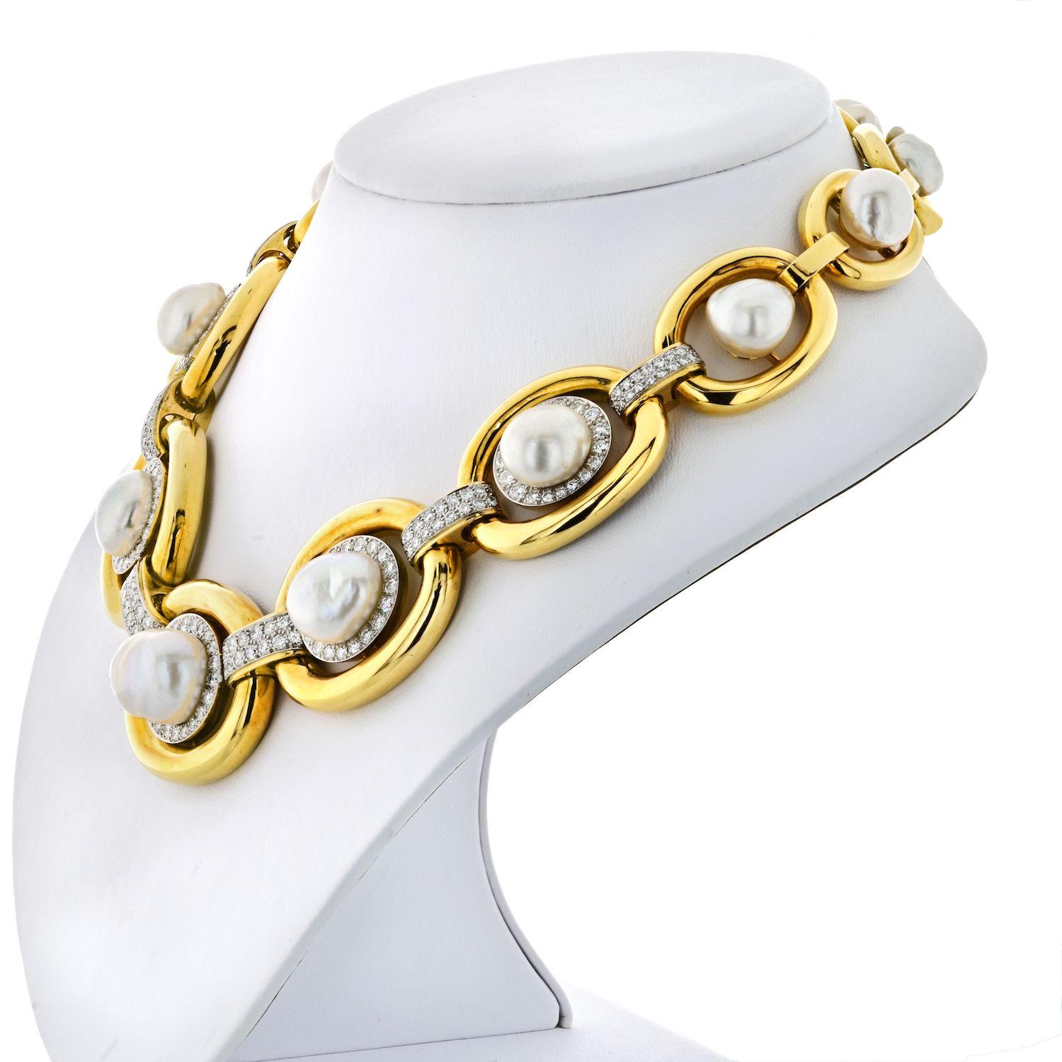 Yellow Gold David Webb pearl and diamond open oval link collar necklace will make any outfit pop. Large gold links with high polish finish and a touch of diamonds around front pearls and in between stations speak class and sophistication. Best of
