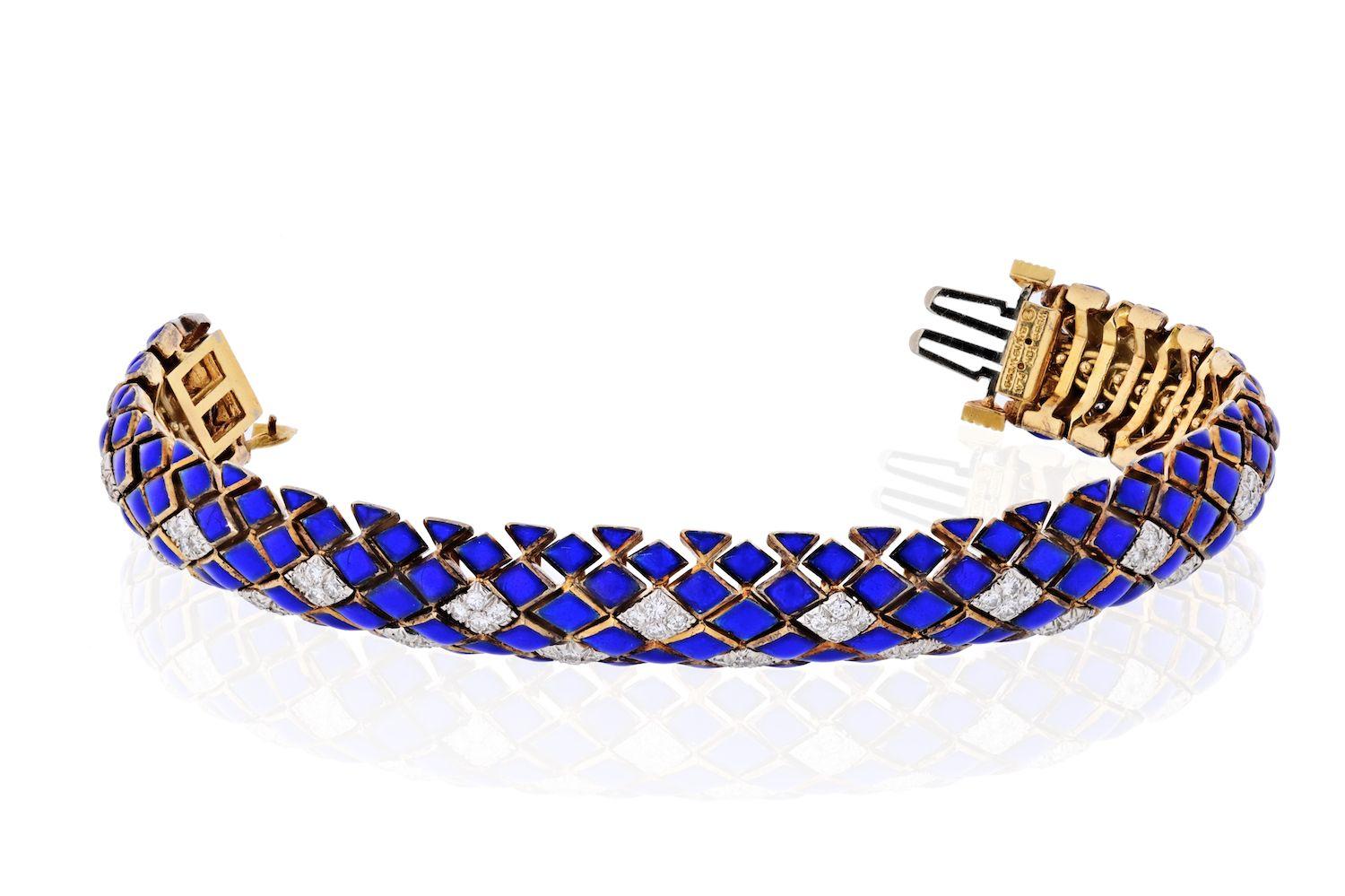Diamond, enamel and eighteen karat gold bracelet, David Webb convex diamond shape links in blue enamel highlighted by round brilliant-cut diamond set links; estimated total diamond weight: 2.30 carats. Length 7 inches. Width: 15mm. Condition: