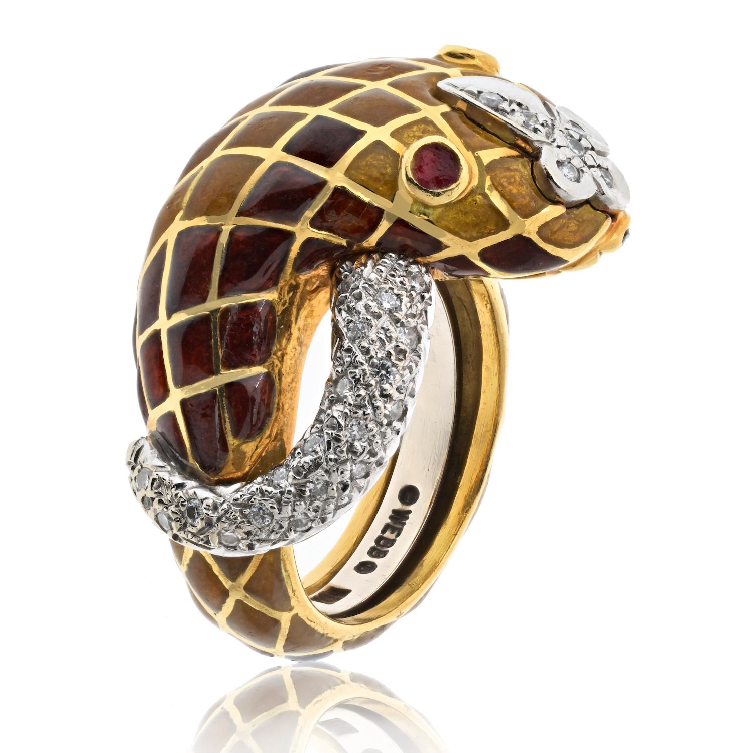 Rich, vibrant hues decorate this lifelike snake ring, as its body coils around your finger in a harlequin pattern of enamel and diamonds. Rubies gleam in its eyes, complementing the golden mustard and reddish-brown shades of its 