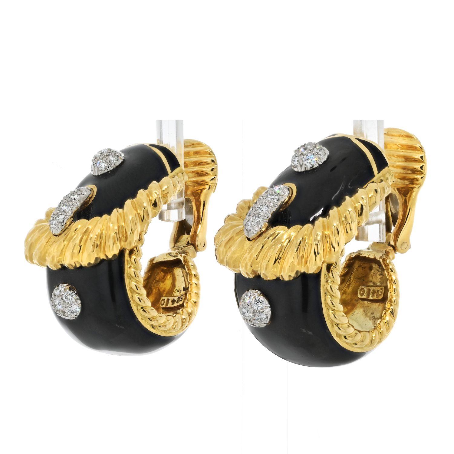 Introducing a striking pair of David Webb signature buckle design earrings, exuding a bold and captivating presence. These unique earrings are crafted as clip-ons, ensuring ease of wear for those without pierced ears. The earrings feature a large