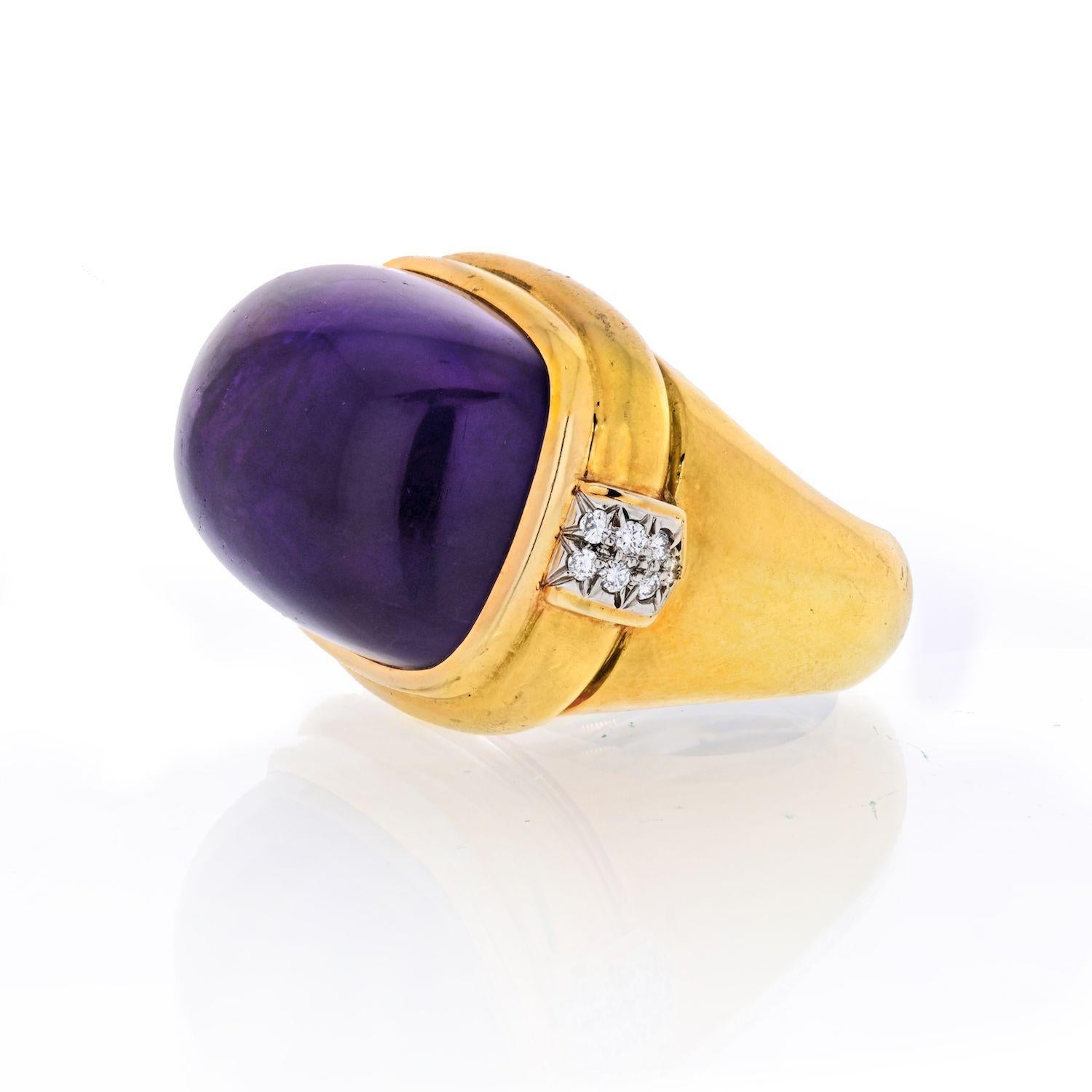Vintage cabochon amethyst ring by David Webb crafted in 18K Yellow Gold. Mounted with purple amethyst and pave round cut diamonds. 
Curently size 6 can stretch to 7. 
Large statement piece.
Measures: 32mm wide and 22mm long. 
Amethyst has slight