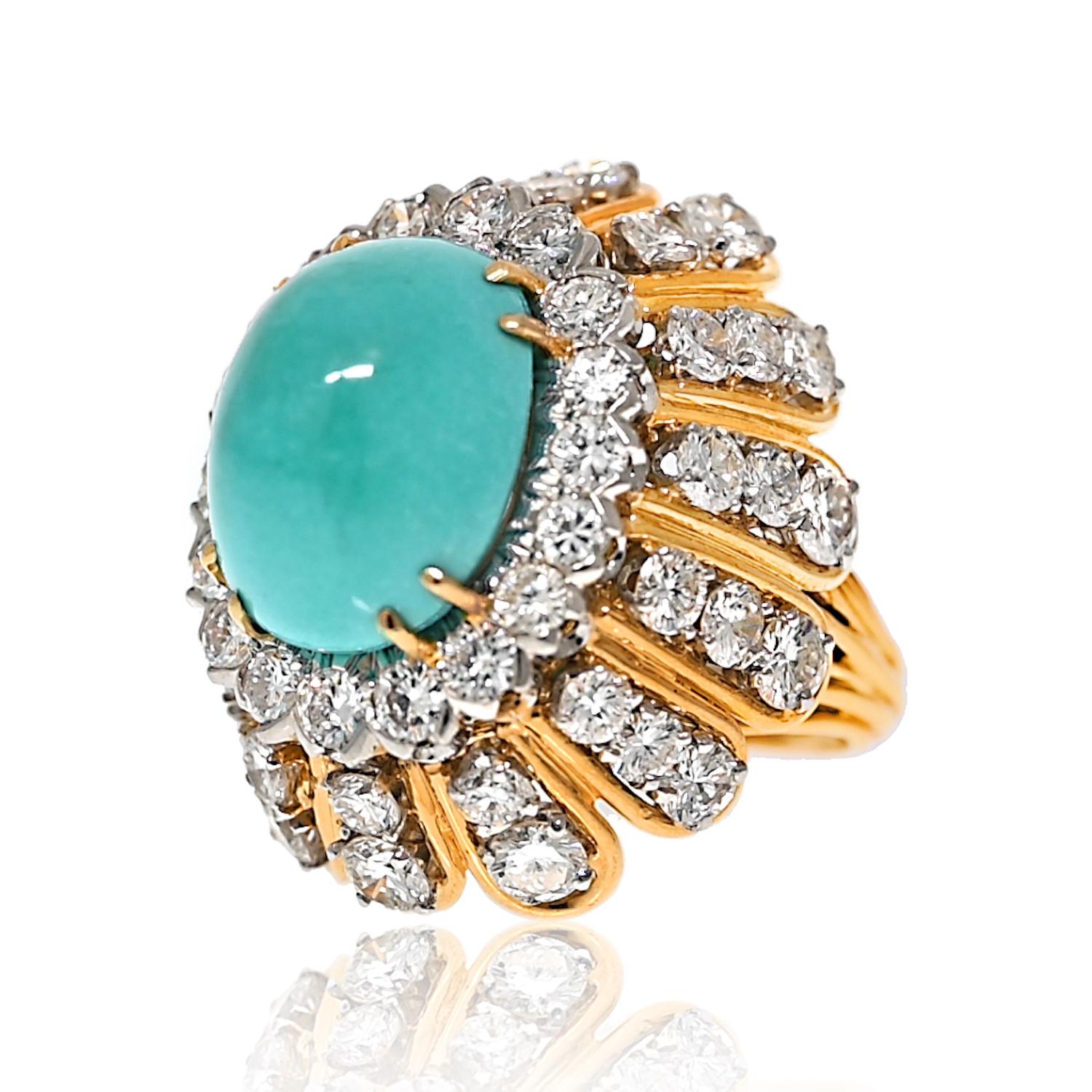 Step into a world of enchanting elegance with this exquisite cabochon cut turquoise and diamond impressive cocktail ring by the renowned designer David Webb. 

The focal point of this captivating piece is a mesmerizing sky blue cabochon turquoise