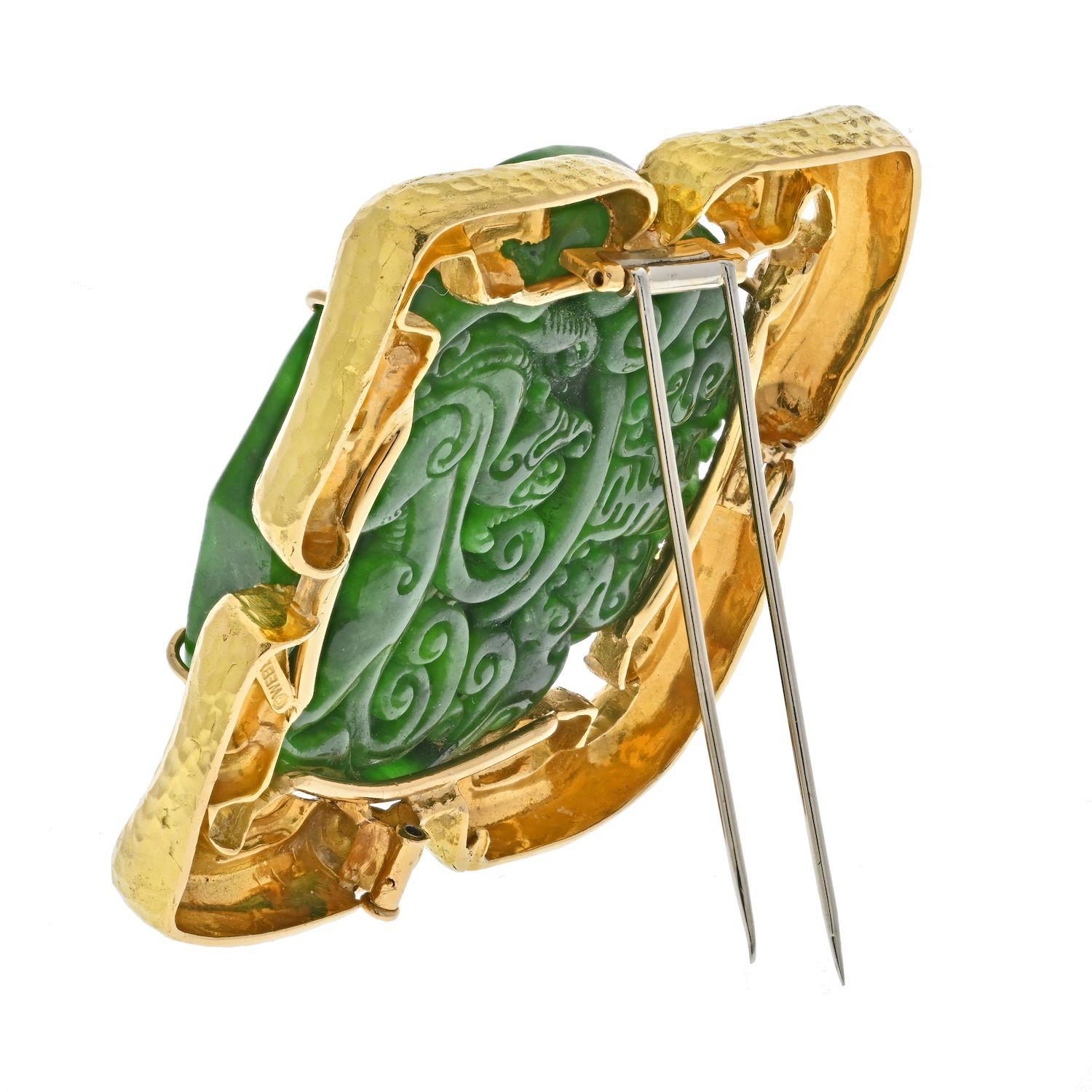 David Webb 18K Yellow Gold Carved Round Jade Pendant And A Brooch.
This substantial brooch is something special and rare, mounted with a round carved Jade this brooch by David Webb will make a visual statement whereever you are. Wear it as a brooch