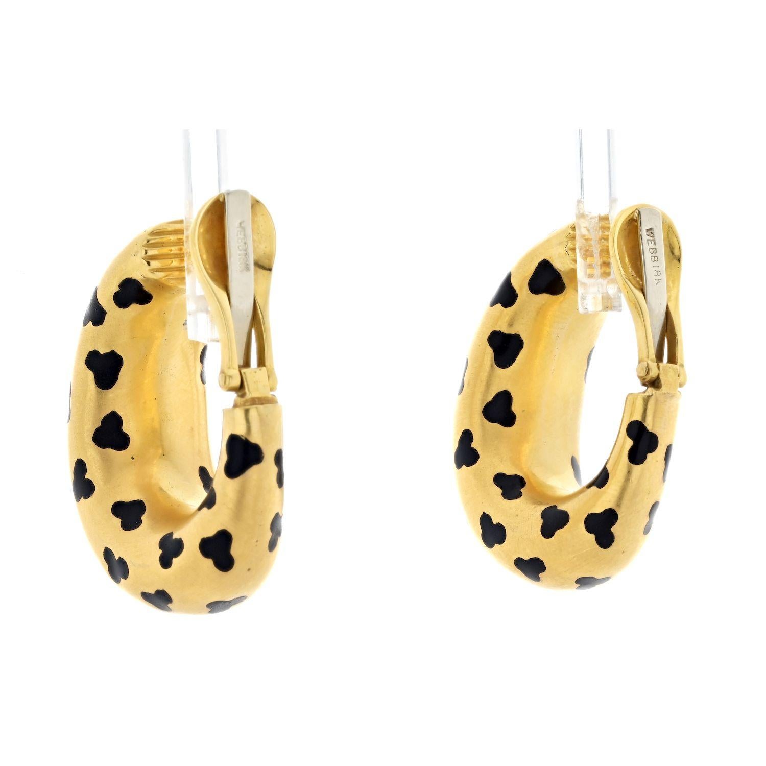 David Webb Platinum & 18K Yellow Gold Leopard Spotted Hoop Earrings.
David Webb oval-shaped hoop earrings in matte polished 18k yellow gold. Tapered, curved design measuring 30mm in length and 10-12mm in width. Clip-style backs. 
