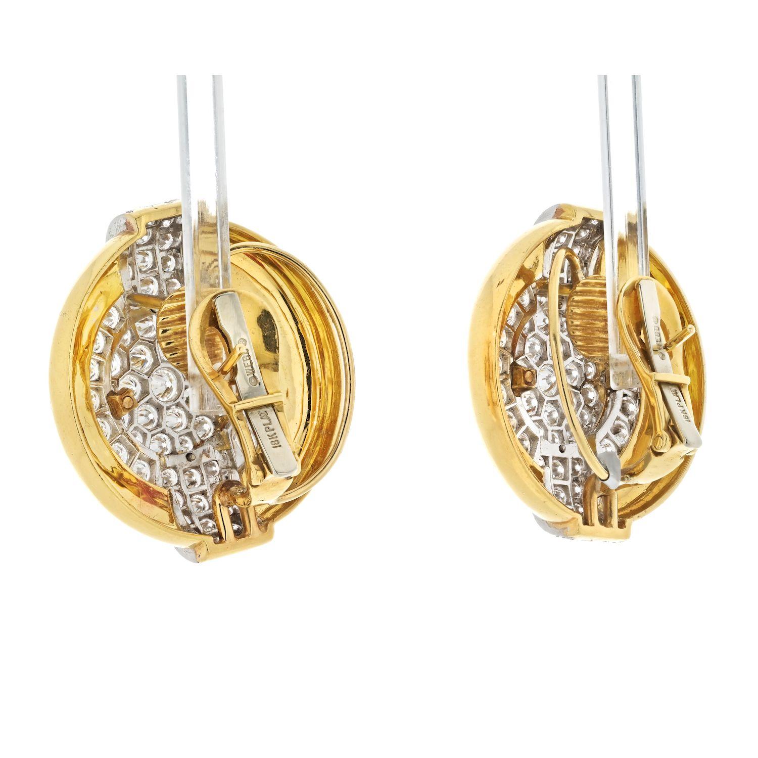 The 1970s-style round brilliant diamond circle clip-on earrings by David Webb are a stunning piece of jewelry. Crafted from 18k yellow gold with diamonds set in platinum, these earrings feature a total diamond weight of 6.00cttw, adding to their