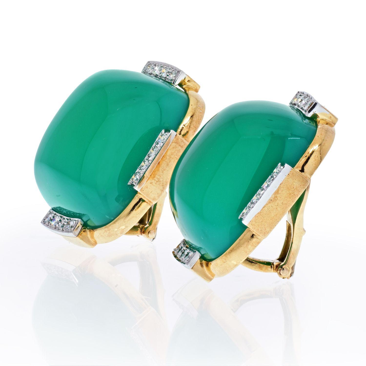 Of a significant size these David Webb Platinum & 18K Yellow Gold Onyx Earrings feature bright green cabochons that are lightly framed by diamonds. 
Beautiful color reflects with a natural green against gold frame. 
Green Onyx: approx. 47.95 and