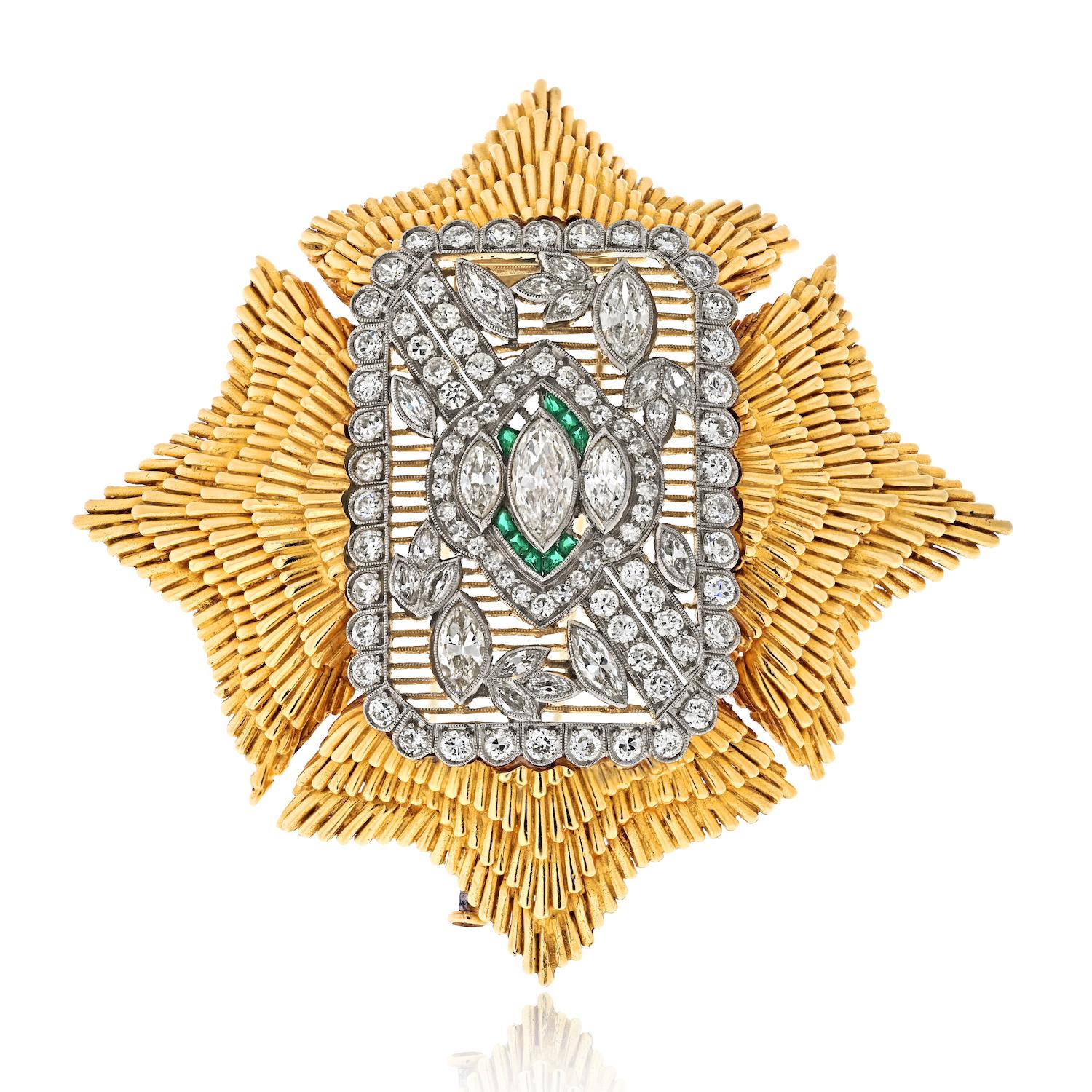 Indulge in the timeless allure of this David Webb 18K Yellow Gold, Platinum, Diamond, and Emerald Brooch, a magnificent piece that exudes elegance and sophistication. Crafted with utmost skill and artistry, this brooch is a true representation of