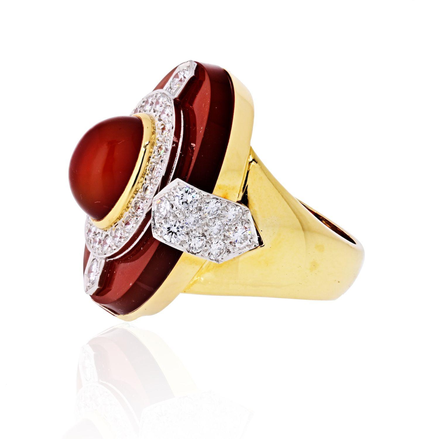 David Webb Streamline Carnelian & Diamond Cocktail Ring in 18k Yellow Gold.
Carved and cabochon carnelian, brilliant-cut diamonds, 18K yellow gold, and platinum. 

Size 6.

