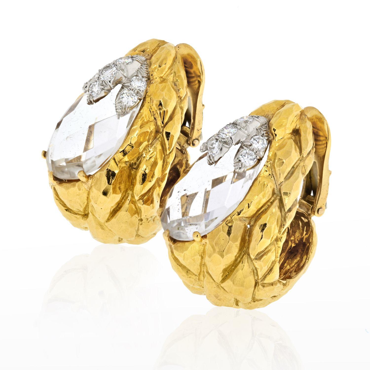 Large David Webb Platinum & 18K Yellow Gold Rock Crystal Carved Clip On Earrings. A pair of vintage David Webb earrings; featuring rose cut carved rock crystal, with gold leaf style garland tops, accented with a round brilliant-cut diamonds. Circa