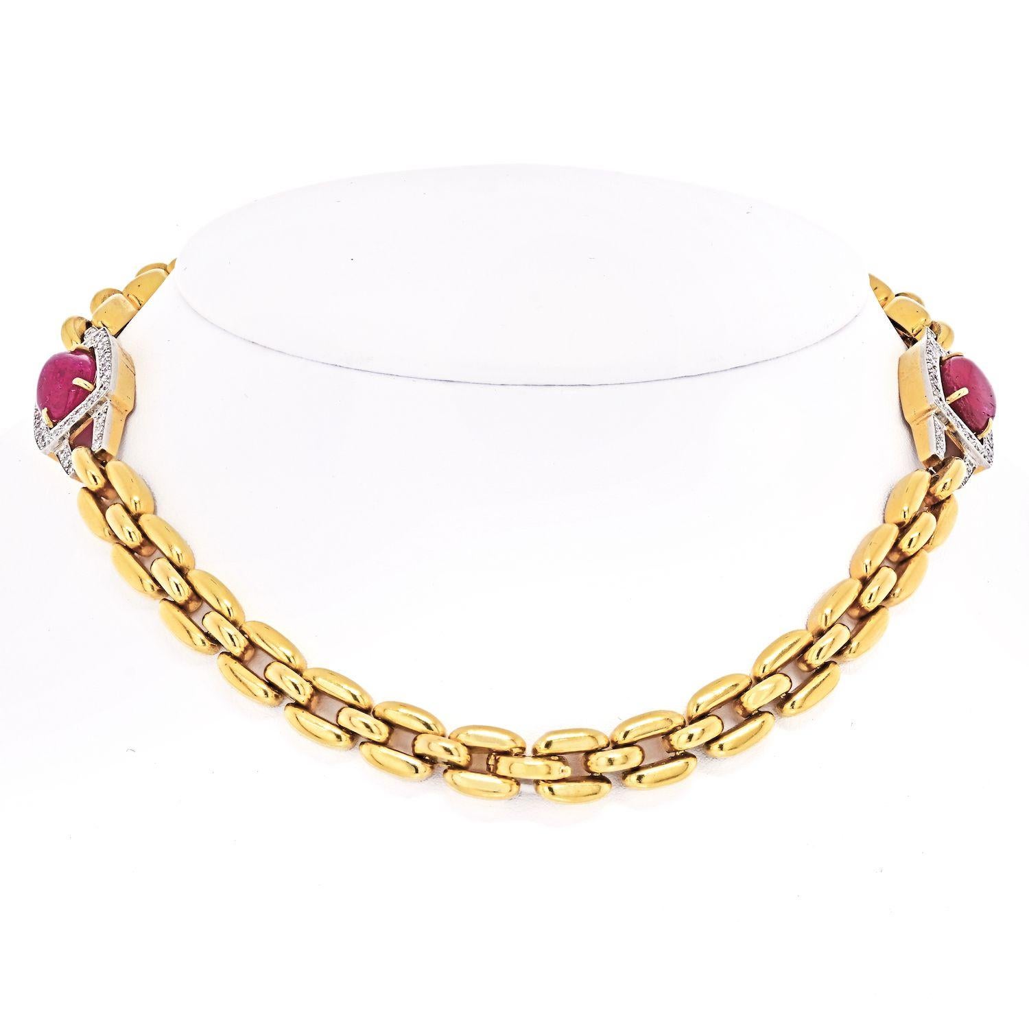 Bold yet elegant necklace created by David Webb in the 1970s. Features two cabochon rubies accented with round diamonds set in yellow gold.
The necklace comes apart and turns into two bracelets. The bracelets are 7.25