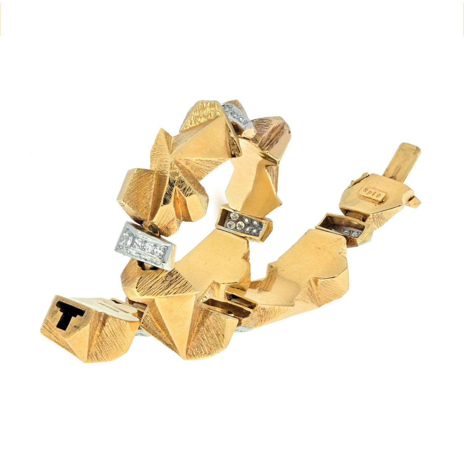 Very unusual bracelet by David Webb that is crafted in a very articulated manner, featuring gold nuggets or 