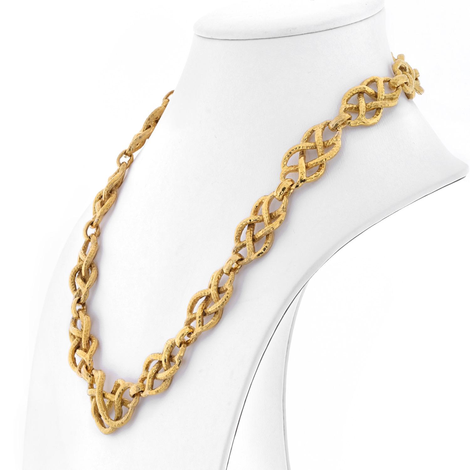 Beautiful hammered scrolled gold links is an iconic look for lots of David Webb Platinum & 18K Yellow Gold necklaces. 
This necklace is a great looking chain necklace that can be worn on it's own or can fit a brooch of your choice. Ask our experts