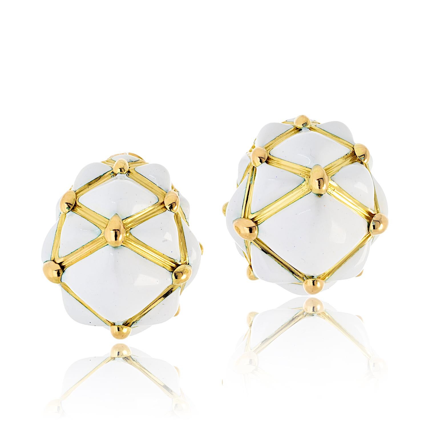 David Webb Platinum & 18K Yellow Gold White Enamel Bombe Dome Geodesic Earrings

Design: Exquisite dome-shaped earrings crafted in 18K yellow gold with a striking trellis pattern that radiates elegance.

Details: The center features white enamel
