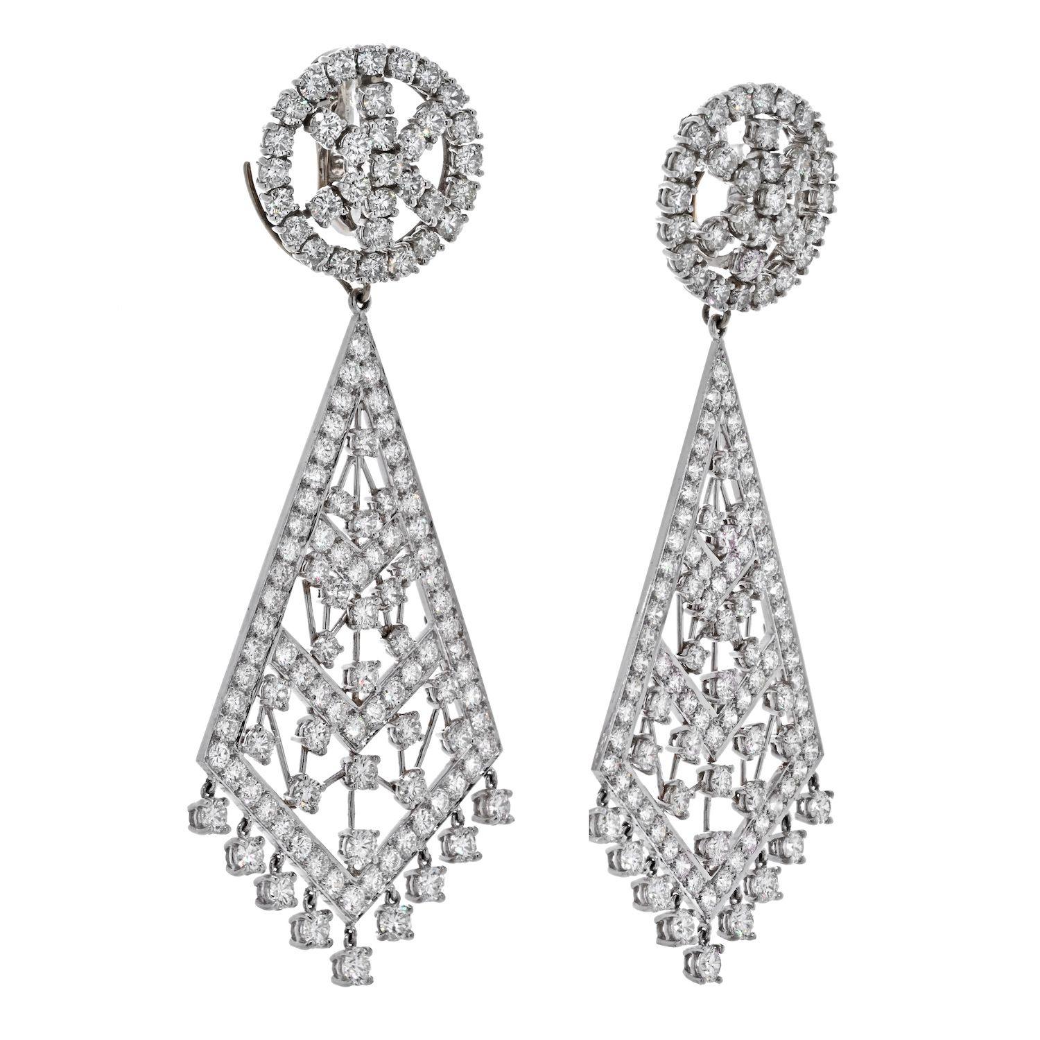 Impressive diamond chandelier earrings by David Webb crafted in Platinum mounted with round cut diamonds of 36.00cttw total weight. Exceptional earrings can be worn day to night with the bottom part easily detachable and top being on it's own as a