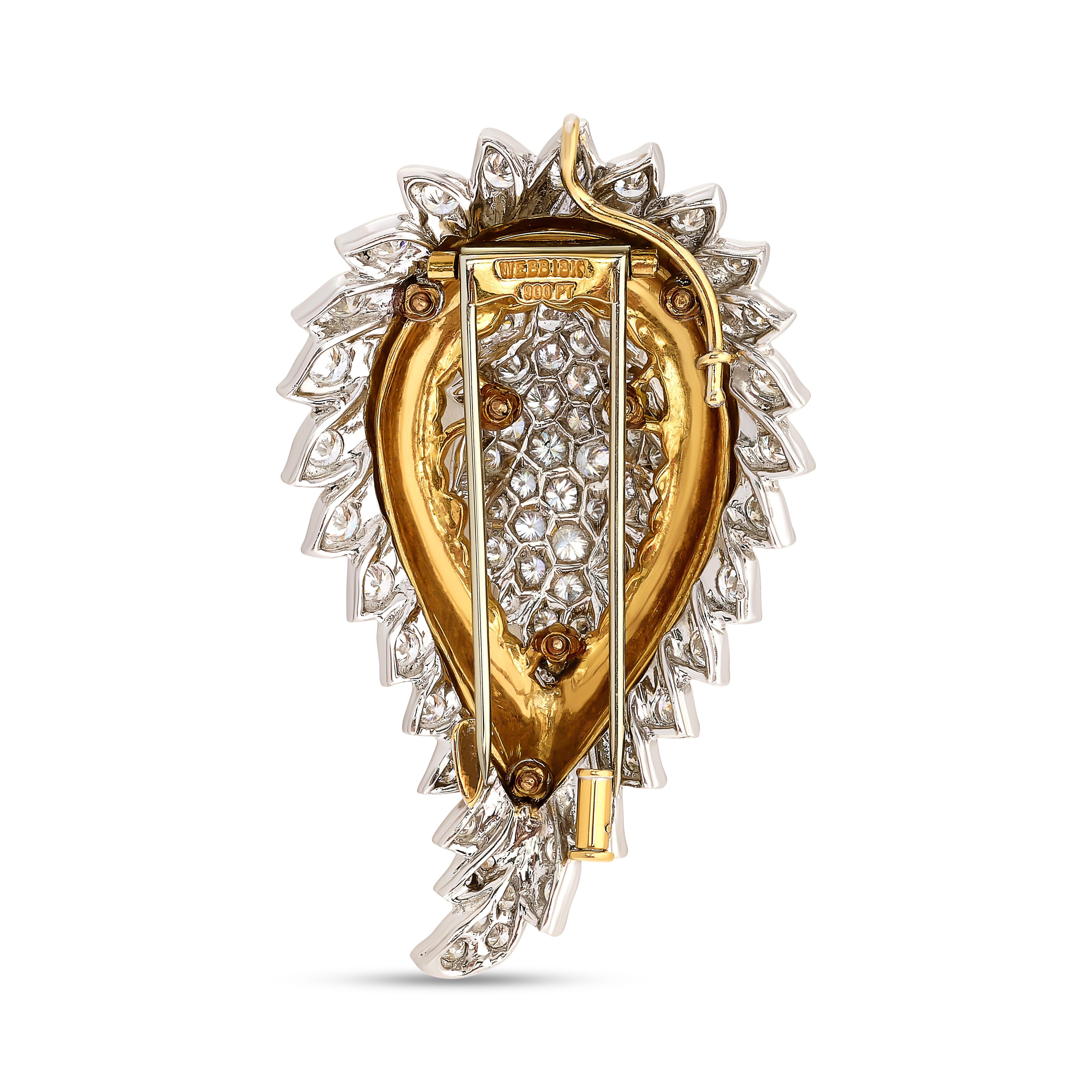 The David Webb diamond paisley pin/pendant dazzles with intricate diamond detailing in a graceful paisley motif, offering versatility and sophistication as a striking accessory.

The pin has 71 round diamonds for an approximate 5.50 carats. The