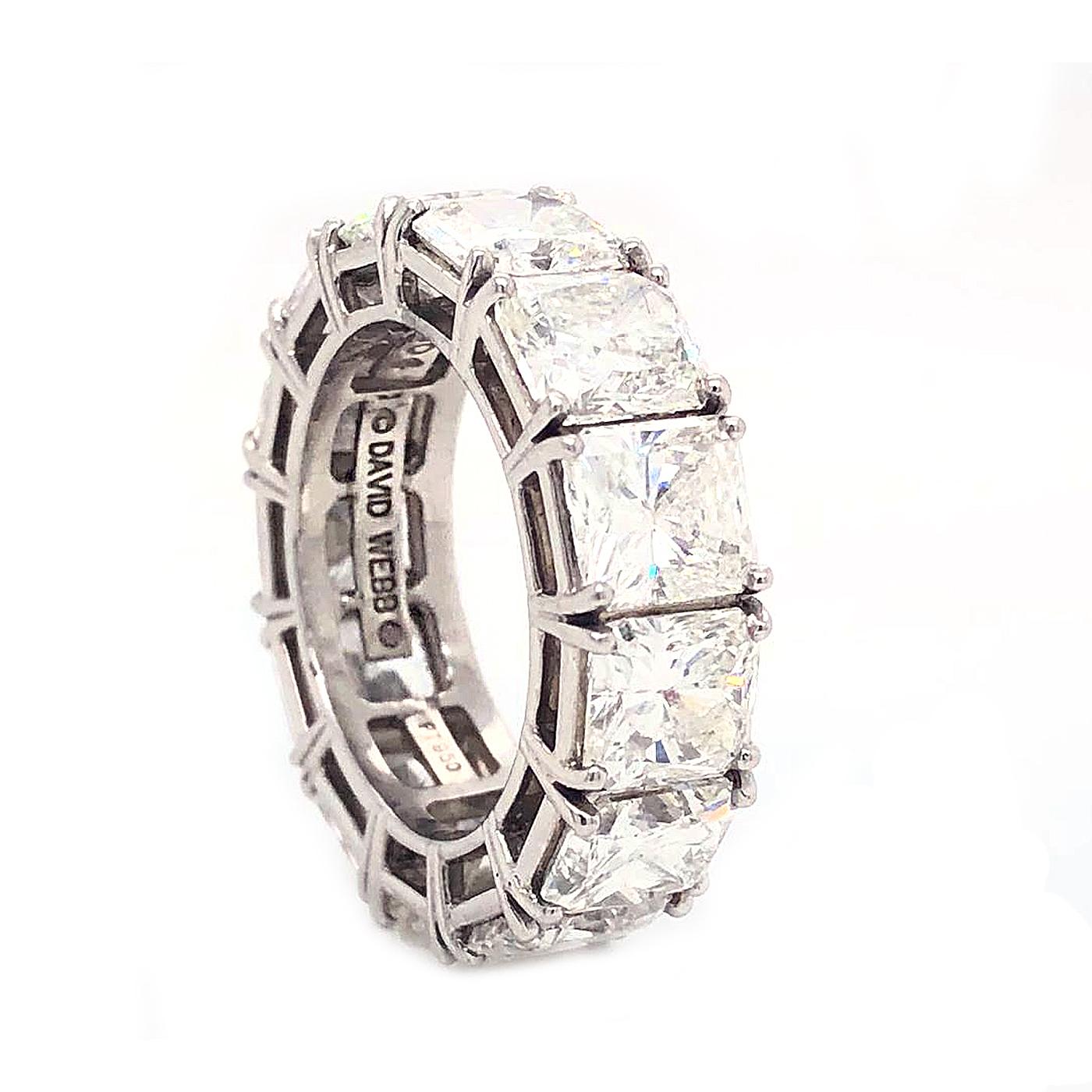 David Webb platinum eternity band is made with 13.79 carats of radiant cut diamonds. Every diamond on this band is GIA certified. This diamond wedding band is stunning the way these stones sit completely around the whole platinum