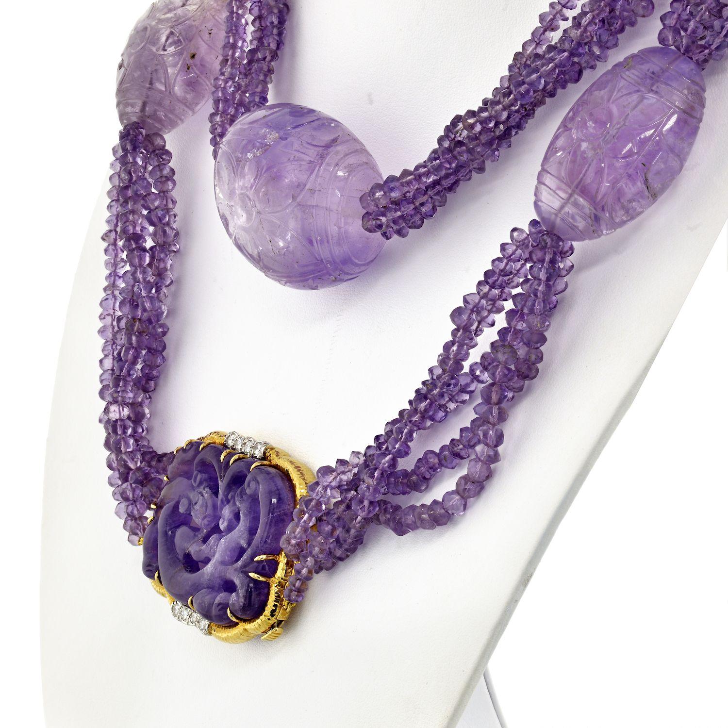This is an impressive David Webb Lavender color Amethyst bead necklace. Composed of 5 strands of amethysts featuring large egg shaped amethyst stations total of 7. Each large amethyst is about 4.5cm in length, and about 10cm in diameter.  
Inside
