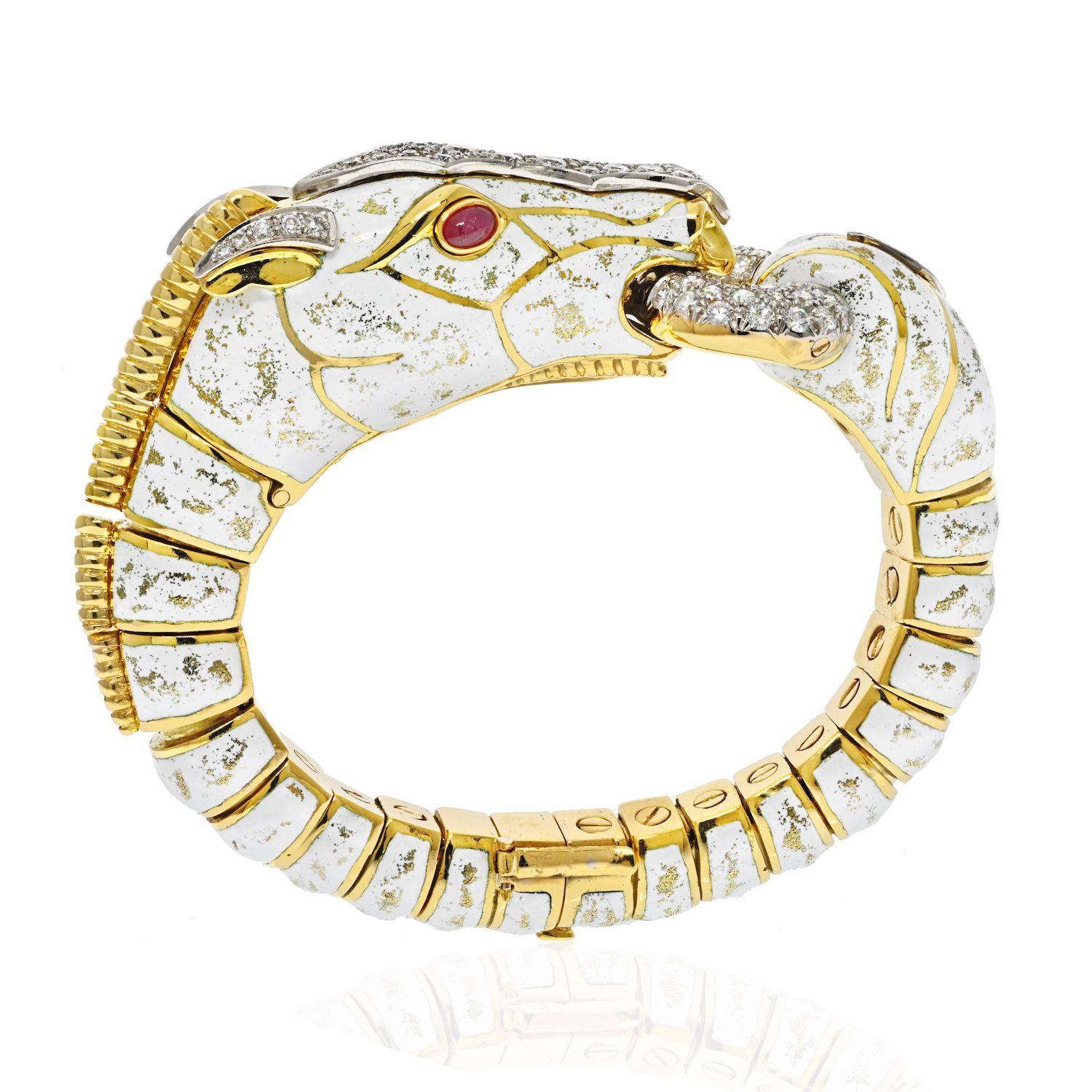 Delight in the equestrian elegance of this David Webb Platinum & 18K Yellow Gold Dappled White Enamel Diamond Horse Bracelet. Created as part of the Animal Kingdom collection by David Webb, this bracelet is not just a piece of jewelry; it's a work