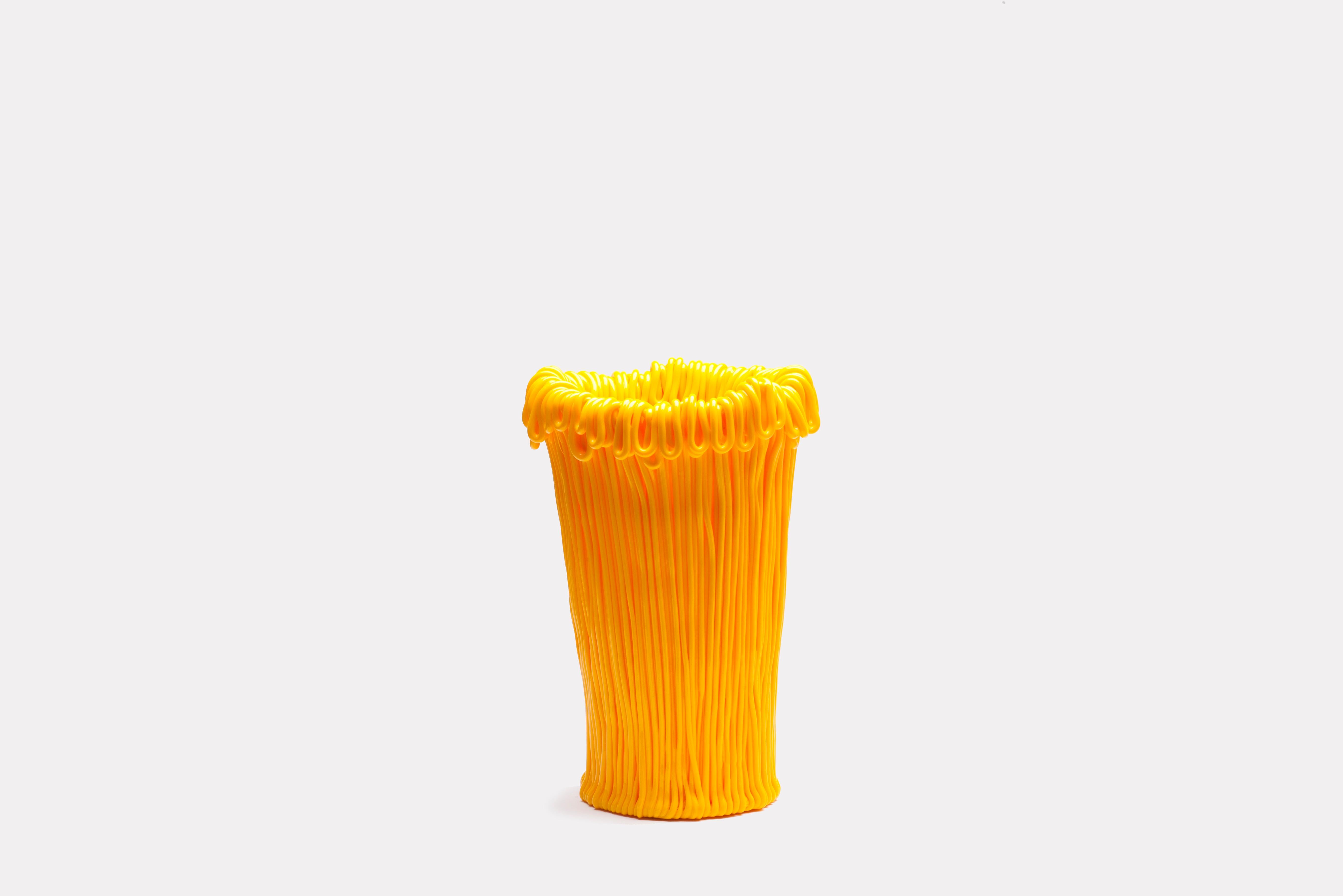 With its blazing colors and expressive shape, the Frillo vase strikes the perfect balance between function and frivolity. Each vase is handcrafted in piped silicone, providing a unique and colorful highlight to any modern interior.