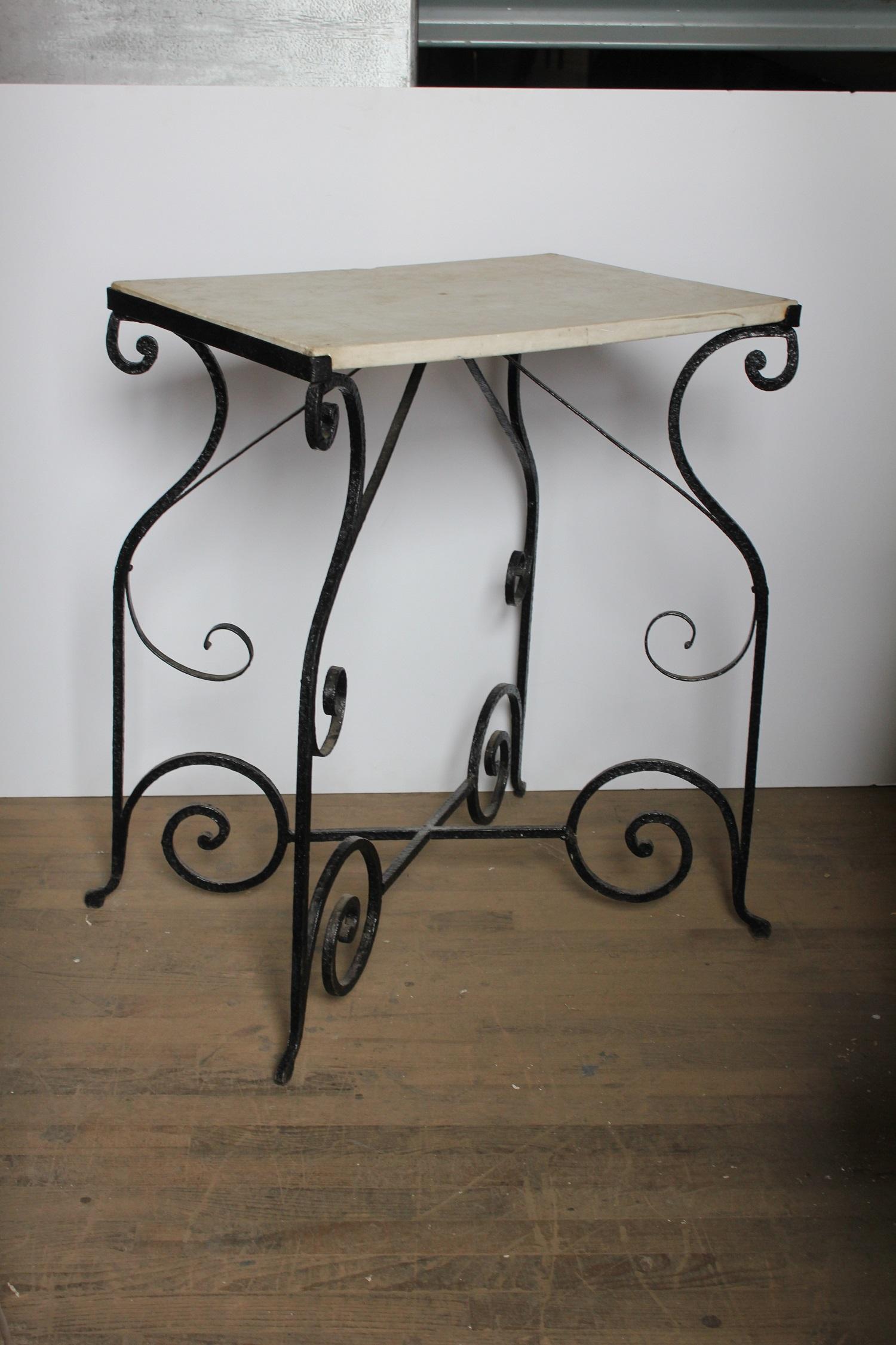 Antique French wrought iron and marble table.
