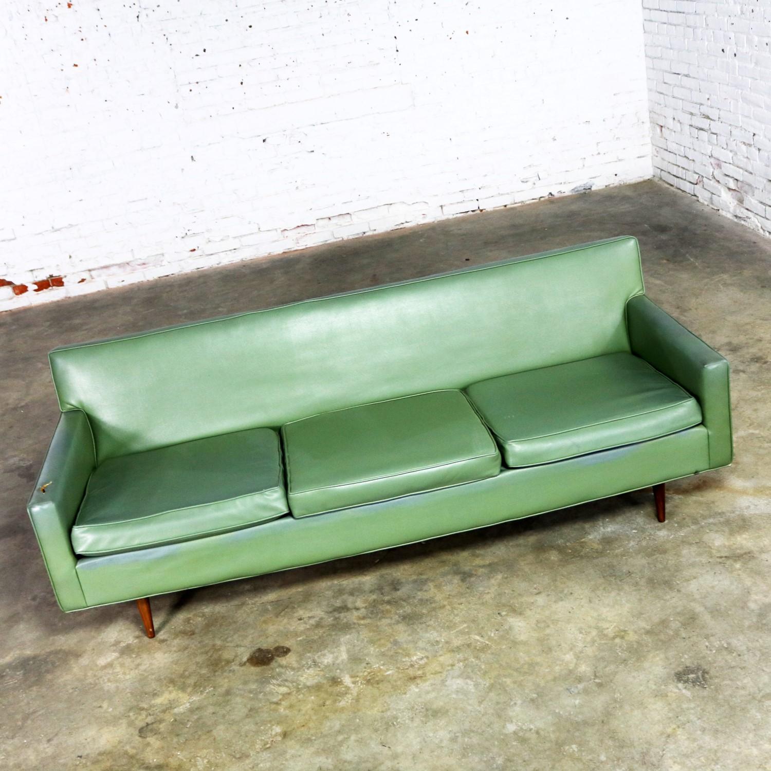 green vinyl couch