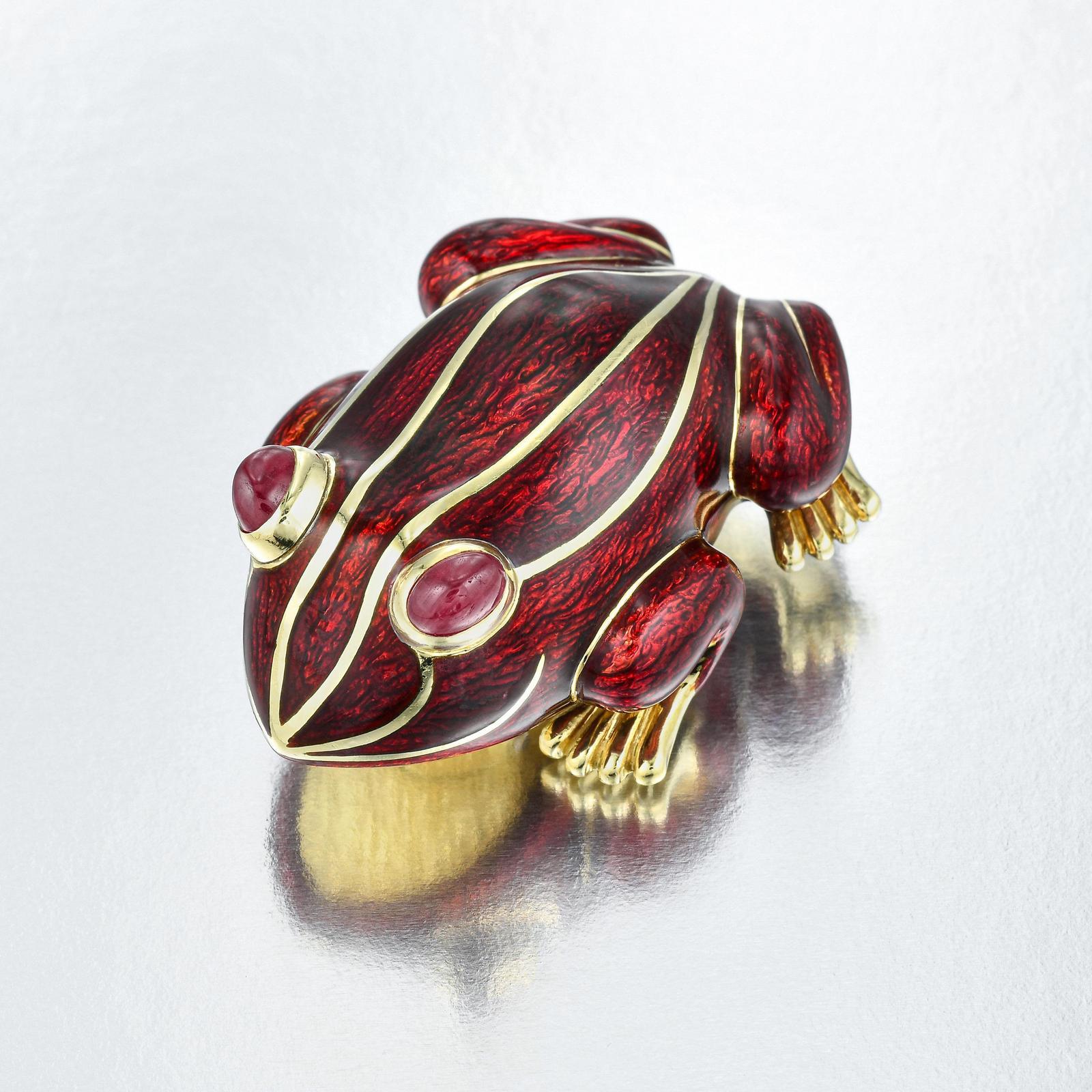 Fantastic brooch artfully sculptured in 18K yellow gold with applied with deep dark red enamel and highlighted with 18K inlaid gold accents
Oval Ruby cabochon eyes set in bezels slightly above the surface
Underside completed with double pin clip