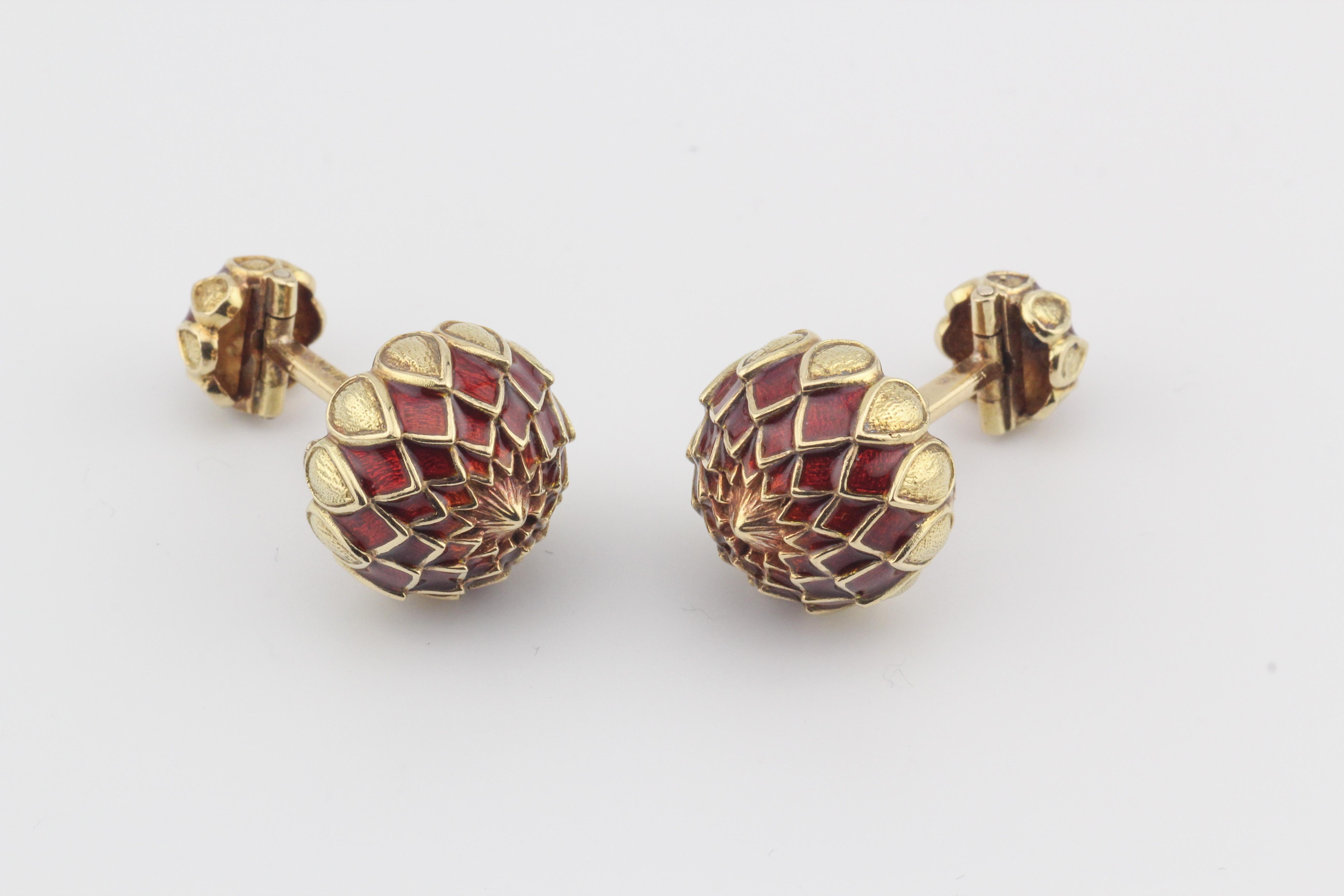 Discover the epitome of vintage luxury with these David Webb Red Enamel 18k Yellow Gold Artichoke Cufflinks, a masterpiece that seamlessly marries bold design with timeless elegance. Crafted by the iconic American jeweler David Webb, these cufflinks