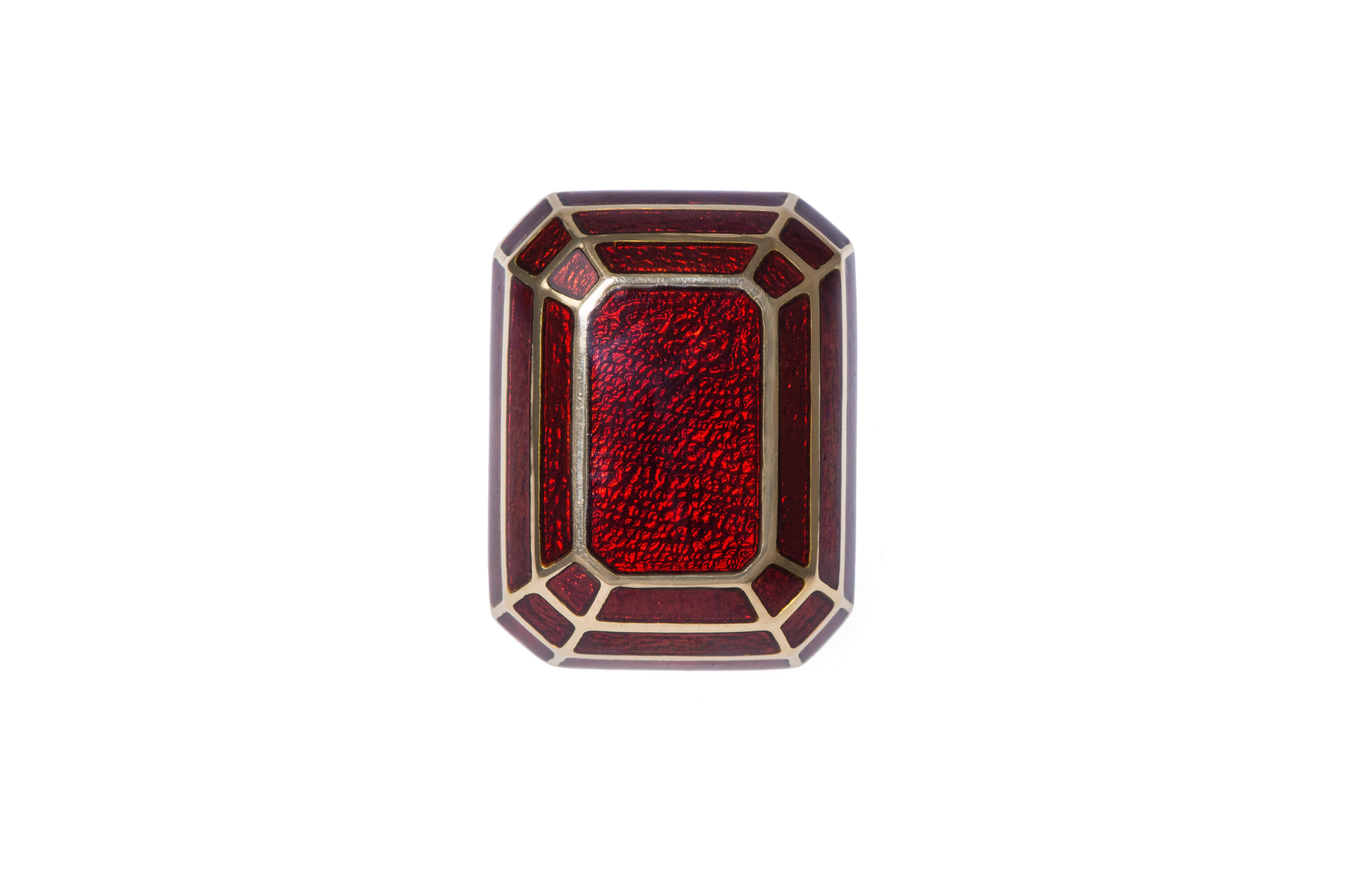 A red enamel and 18 karat gold ring, by David Webb, contemporary.

The ring measures a size 6. It is stamped copyright David Webb, 18k, and numbered FS63.
