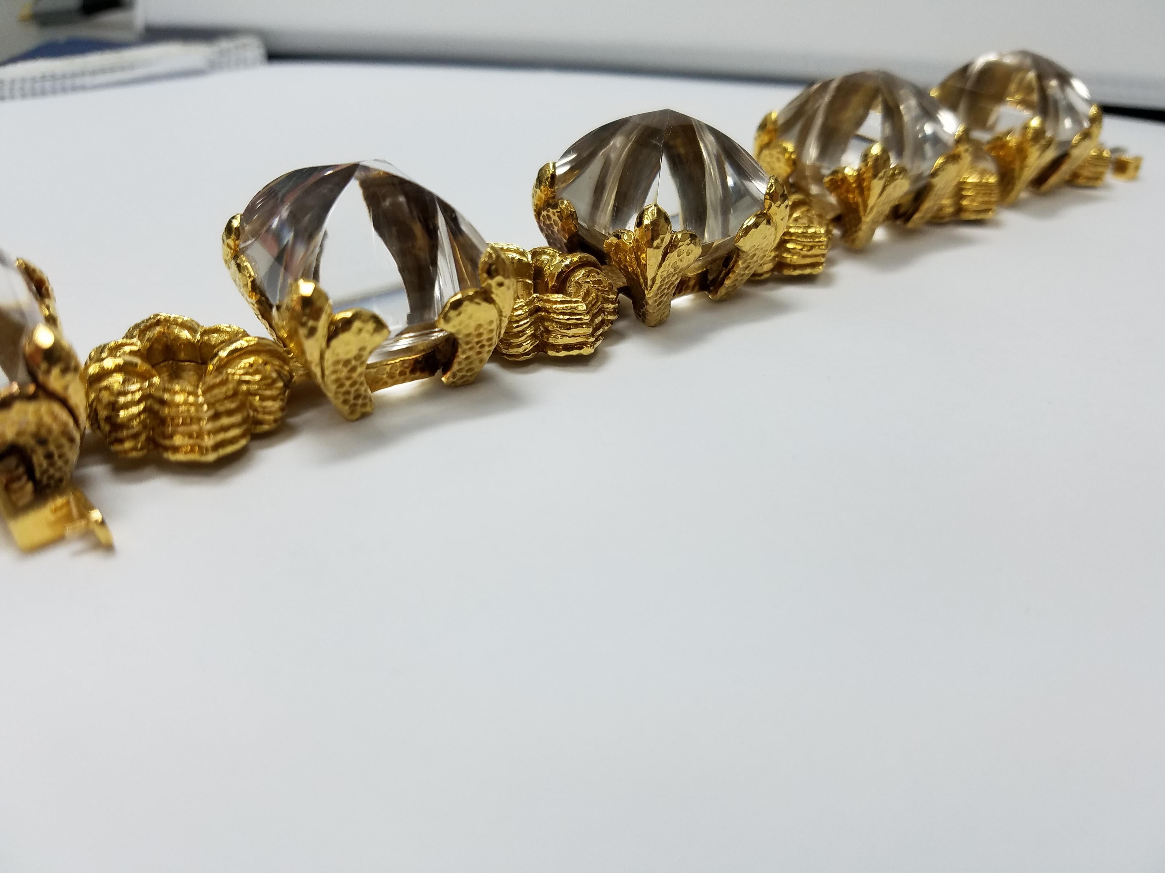 David Webb 18K Yellow Gold bracelet with 5 oversized rock crystals. 