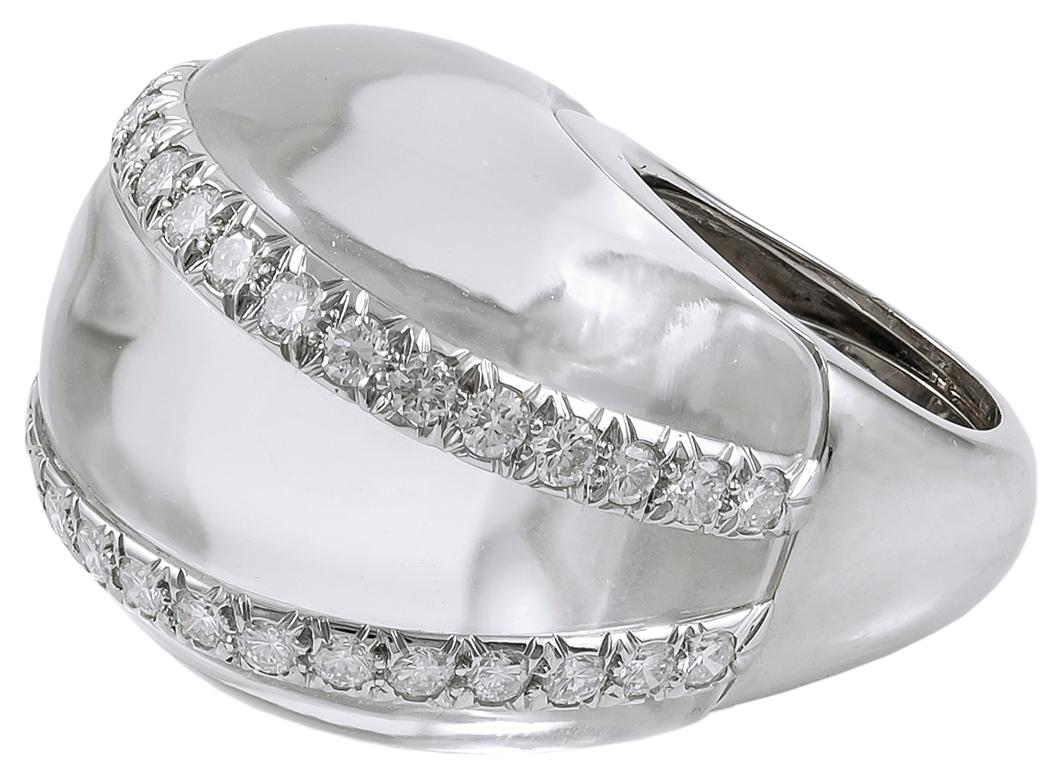 David Webb Rock Crystal Diamond Bombe Ring in Platinum and 18k White Gold.

A juicy bubble of sculpted rock crystal with two rows of inset round brilliant diamonds. The inside of the ring is lined along with a completely metal shank for durability