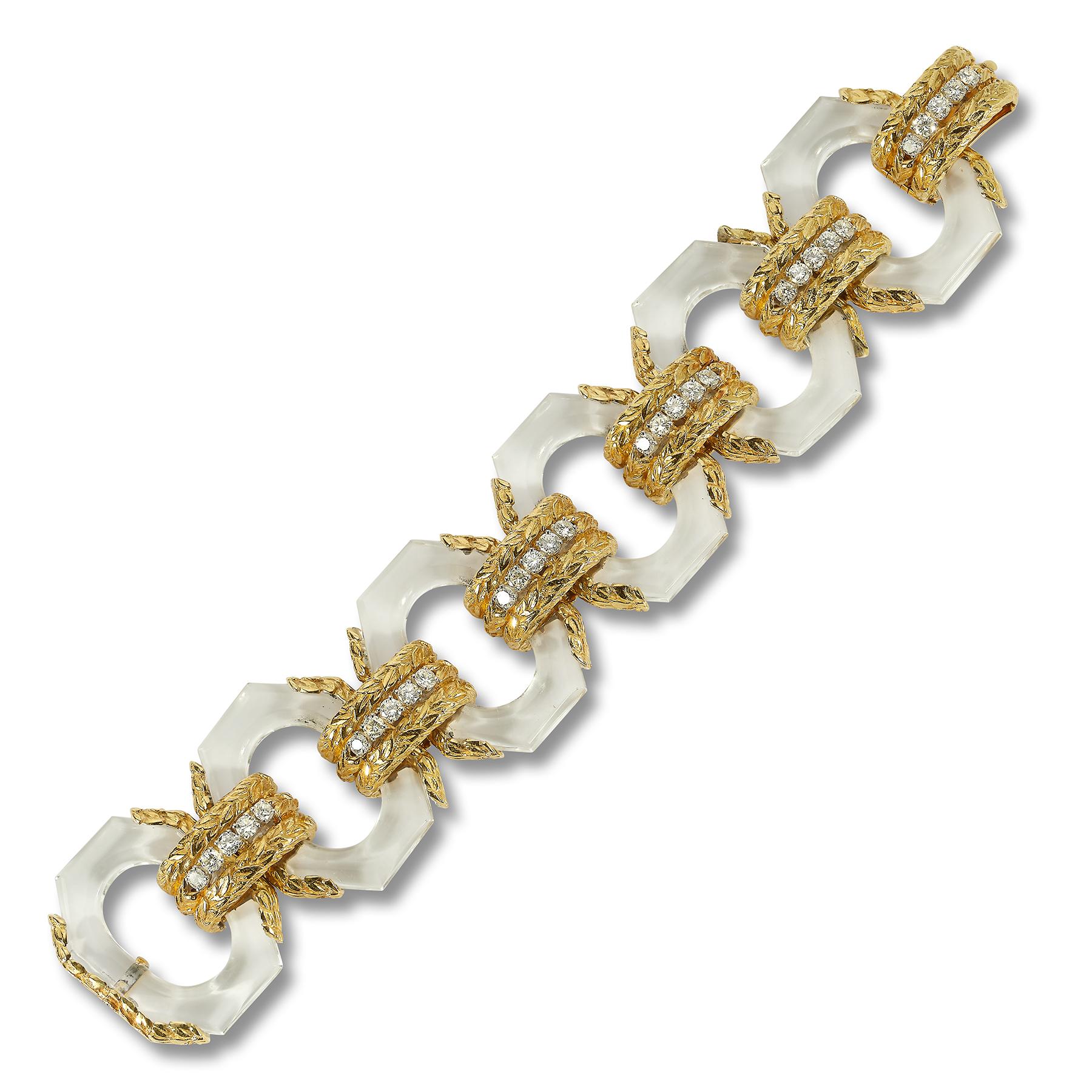 David Webb Bergkristall- und Diamant-Armband

6 Glieder aus Bergkristall, besetzt mit Diamanten und Gold.

Abmessungen: 7.5
