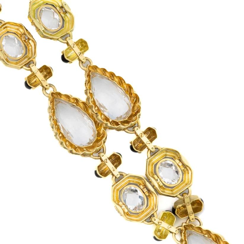 David Webb Rock Crystal Necklace

Enhance your jewelry collection with this striking David Webb Rock Crystal Necklace, a stunning testament to the designer's craftsmanship and artistic vision. This exquisite piece features a series of black enamel
