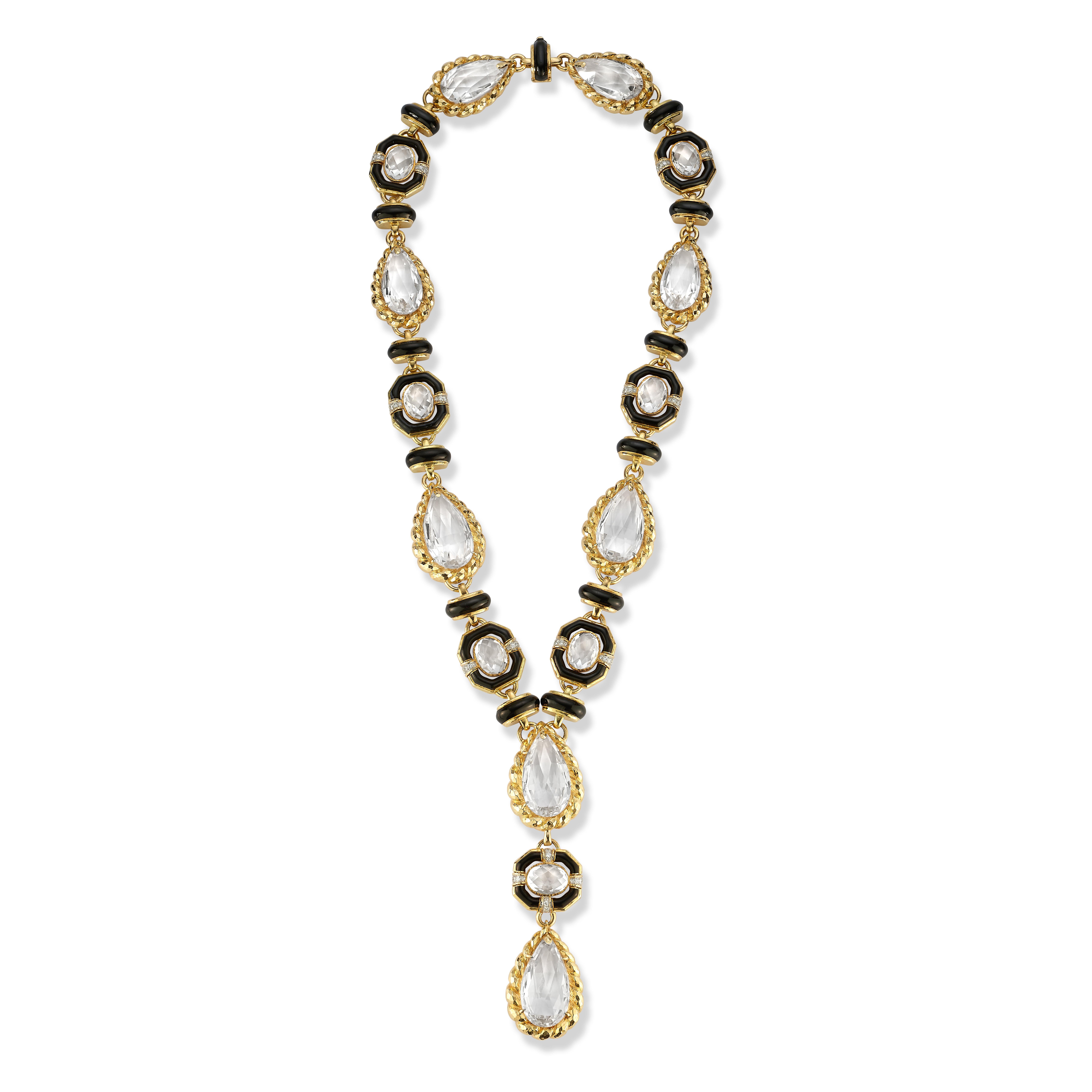 David Webb Rock Crystal Necklace, A large necklace consisting of black enamel links attaching to pear and oval cut rock crystals, and 64 round cut diamonds set in hammered gold. 

Diamond Weight: approximately 3.20 carats 

Measurements: necklace,
