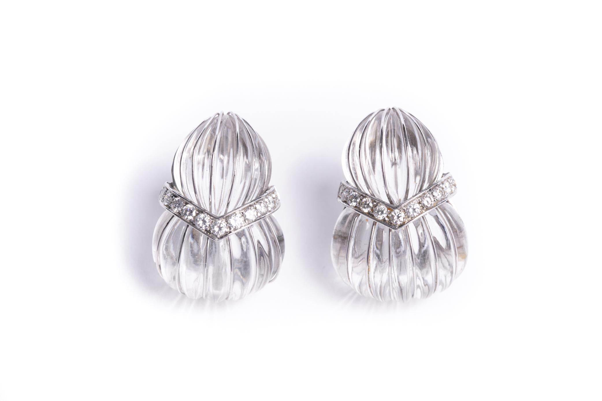 Beautiful David Webb rock crystal earrings with diamonds set in platinum circa 1970's. A wonderful example of Webb's most iconic styles.
