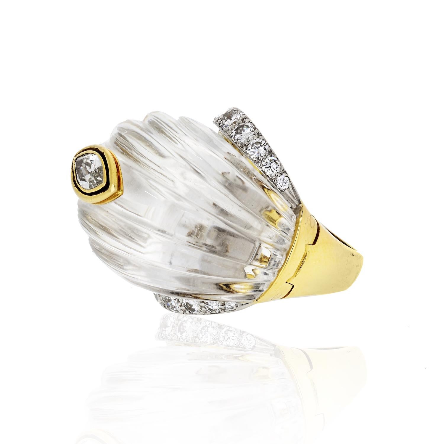 Long thought to have protective and healing powers, rock crystal might be the stone to wear now.
18K yellow gold and platinum David Webb Rock Crystal carved quartz cocktail ring featuring 1.00 carats of round brilliant diamonds at shoulders and a