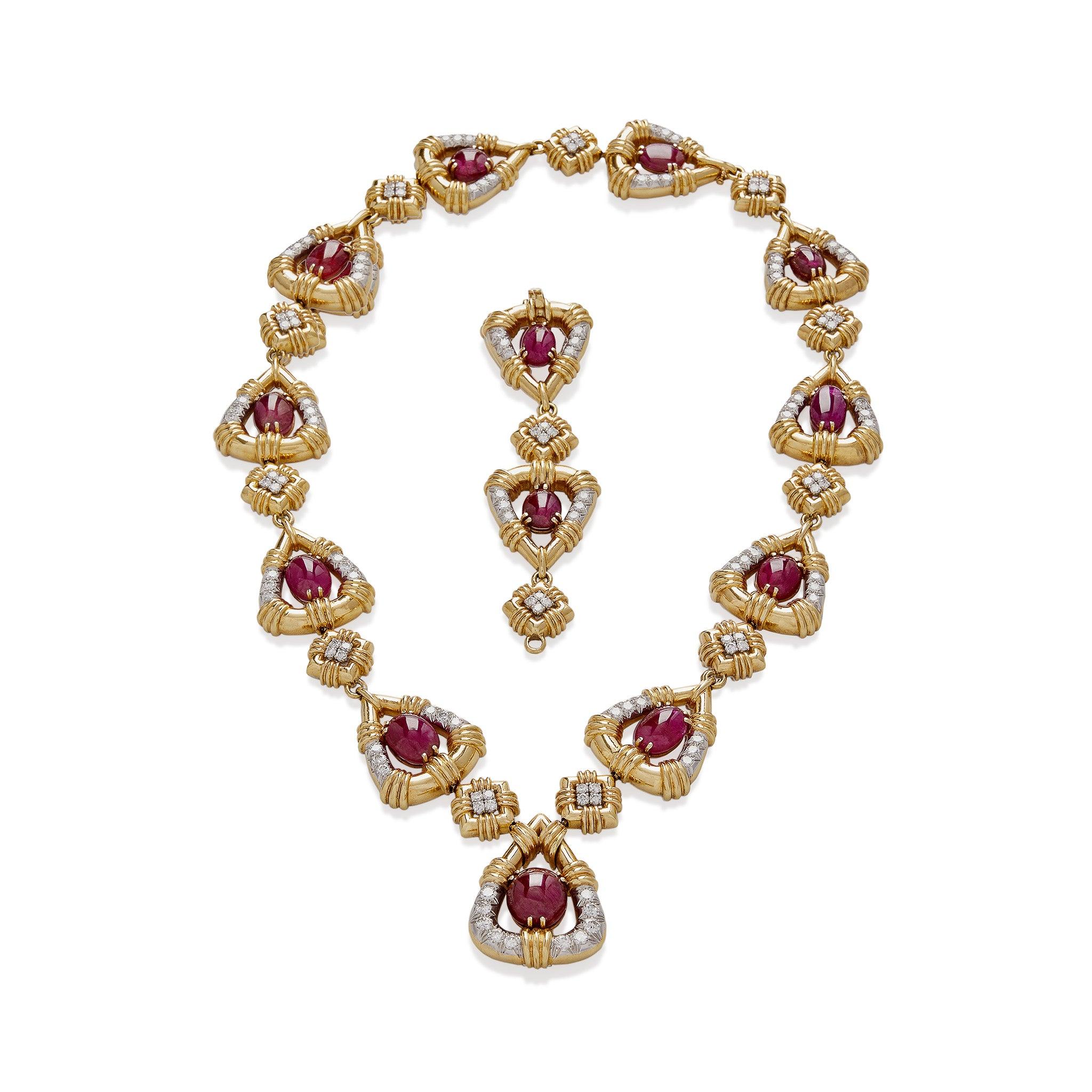 Created in the 1980s, this 18K gold David Webb necklace and bracelet of multiple conversions is set with approximately 110 carats of large cabochon rubies and 15 carats of diamonds. It is composed of tear-drop form ribbed and textured gold links