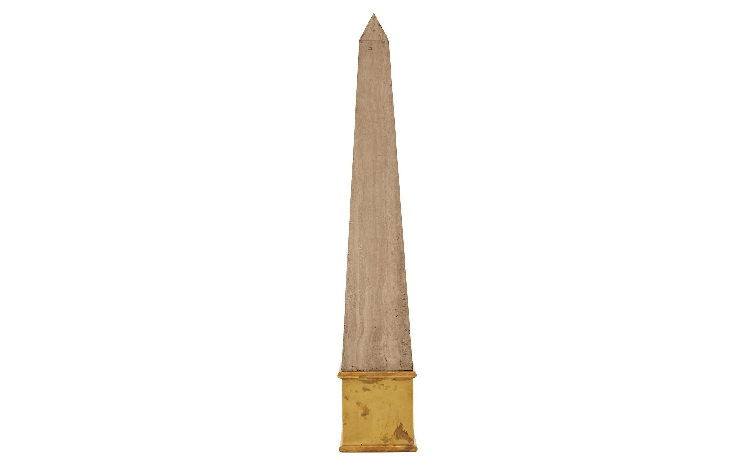 A symbol of the Sun God Ra, obelisks were a prominent element in ancient Egyptian architecture, usually placed in pairs at the entrance to temples. Made in America in the 20th century, our vintage travertine obelisk was modeled after these archaic,