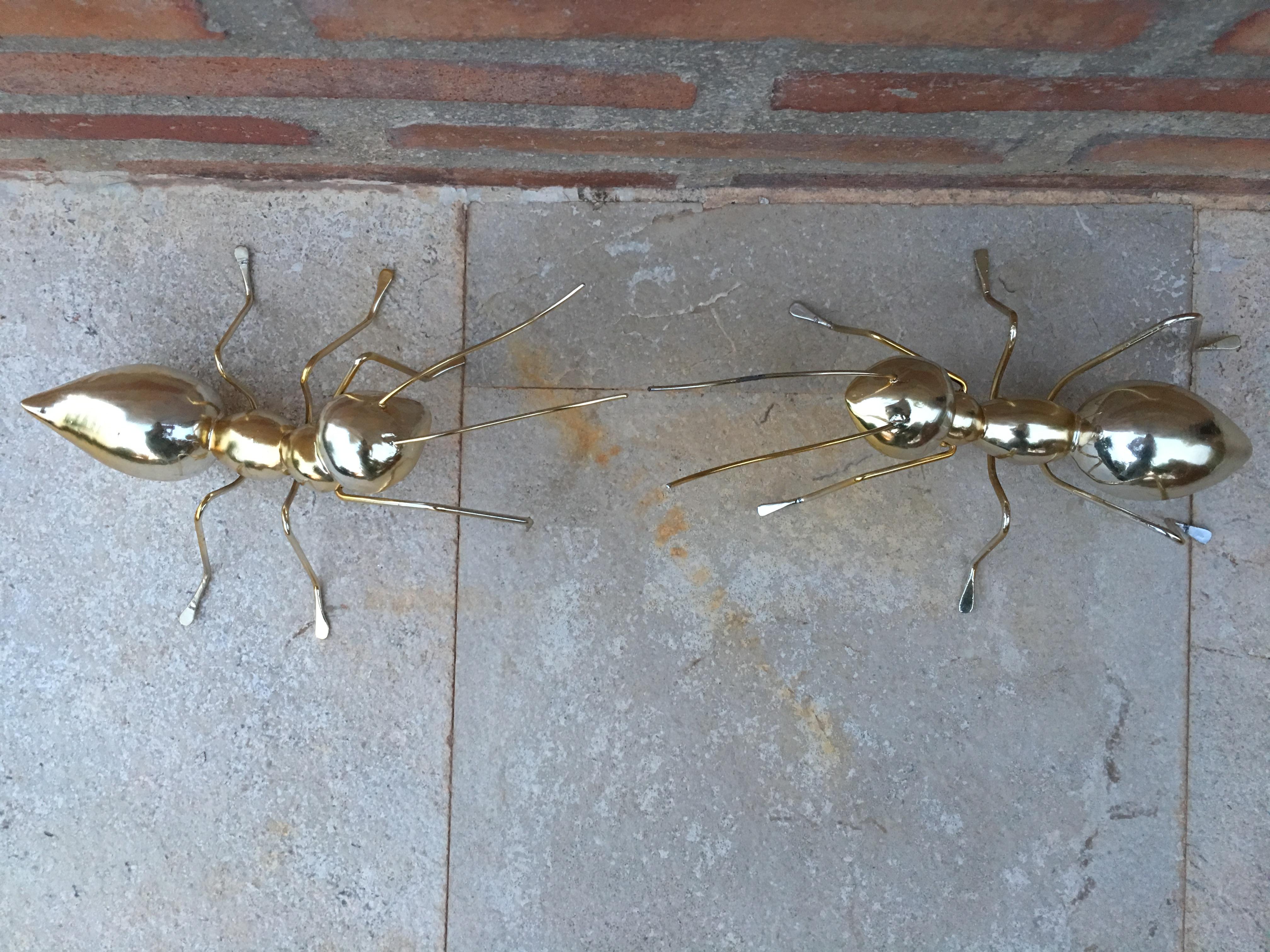 20th pair of decorative metal ants.