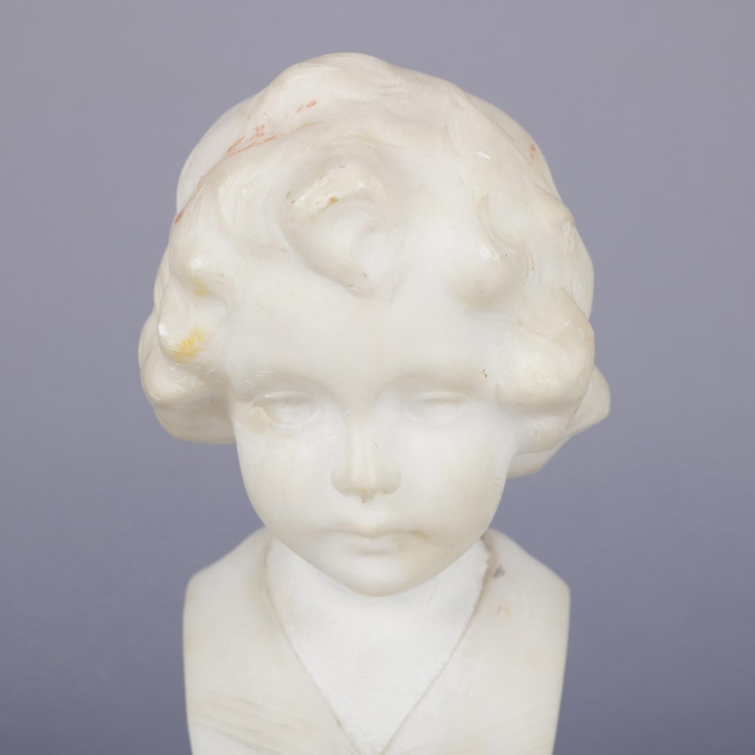 Hand-carved alabaster portrait sculpture of young boy, en verso signed Greiwer, seated on marble Stand, c1900


Measures: 7.5